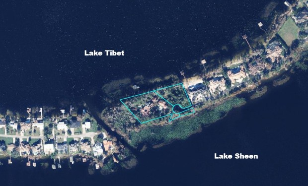 The estate sits on a 2.4-acre double-lot in the gated Cypress Point community. It's on a peninsula with a boat dock on Lake Tibet and front views of Lake Sheen. (Orange County Property Appraiser)