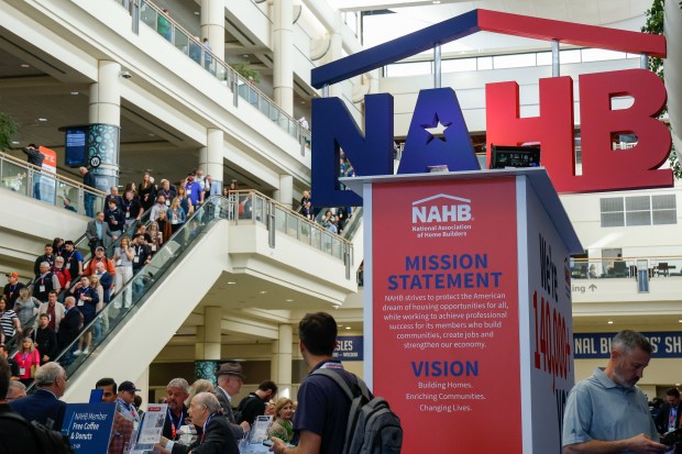 Design and Construction Week attendees make their way to the convention floor for the NAHB International Builders' Show and the NKBA Kitchen & Bath Industry Show, held together at the Orange County Convention Center in Orlando. (Rich Pope/Orlando Sentinel)