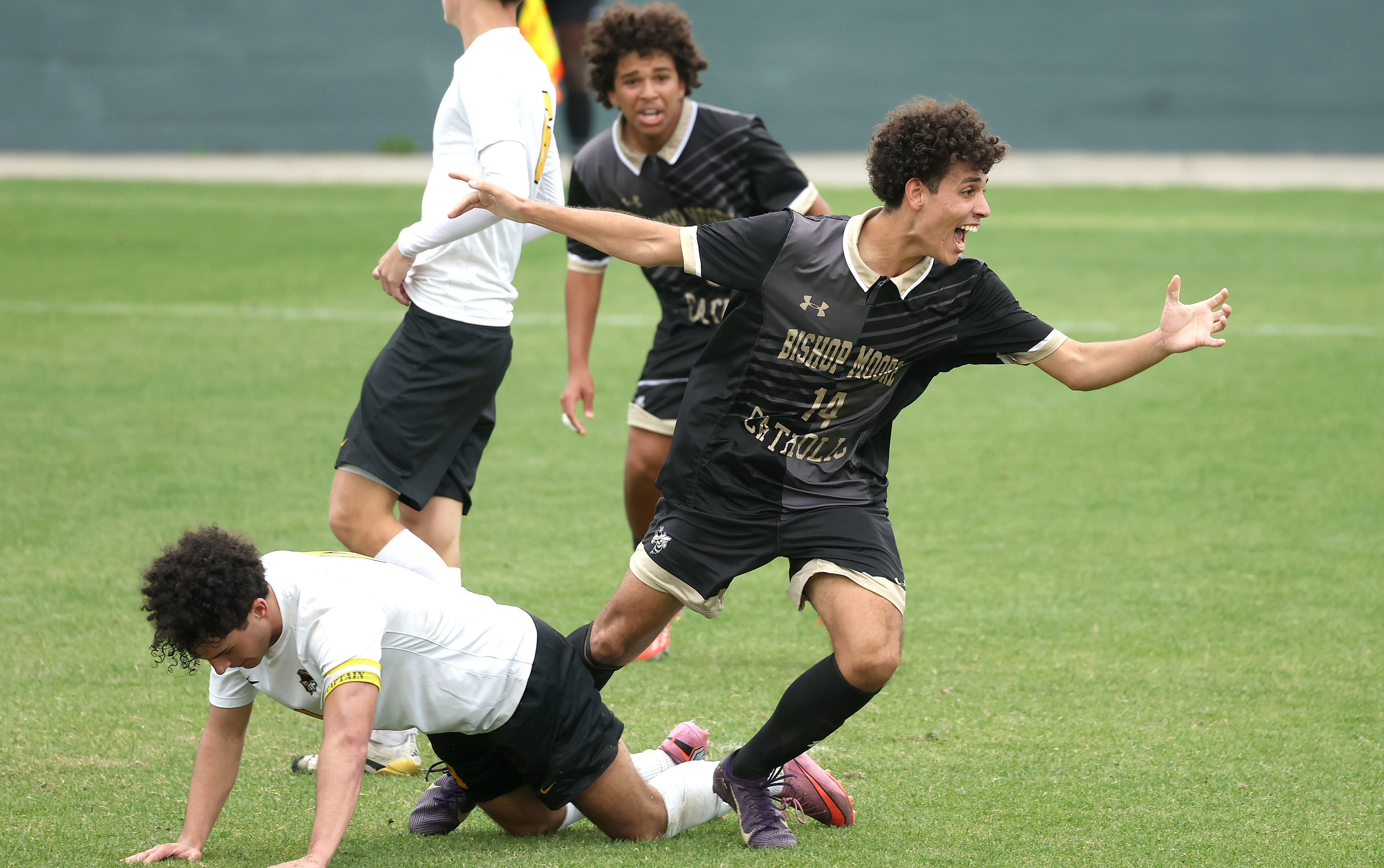 Bishop Moore Catholic High School soccer player Eddie Benitez (14)...