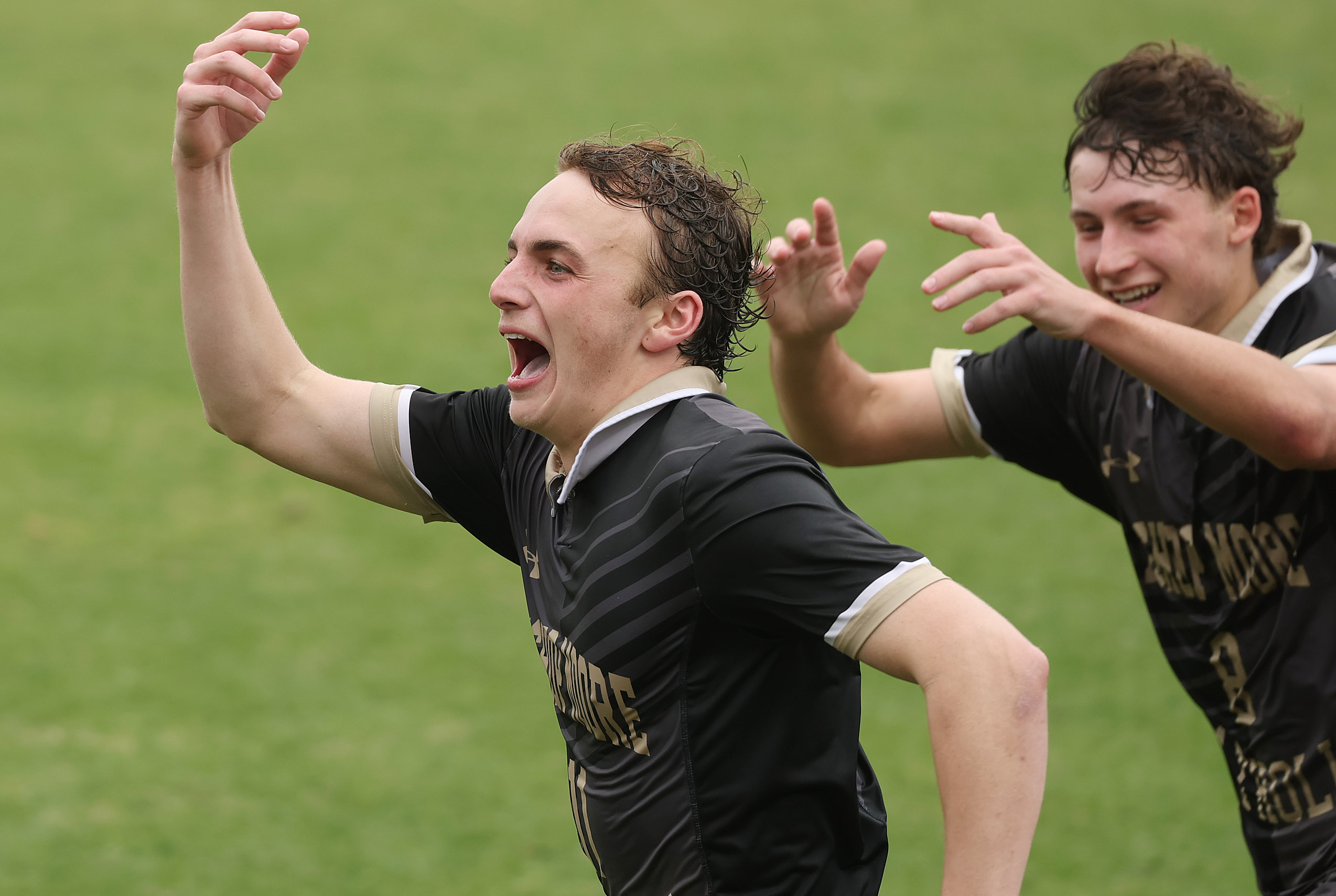 Bishop Moore Catholic High School soccer players Winston Weibel (11)...