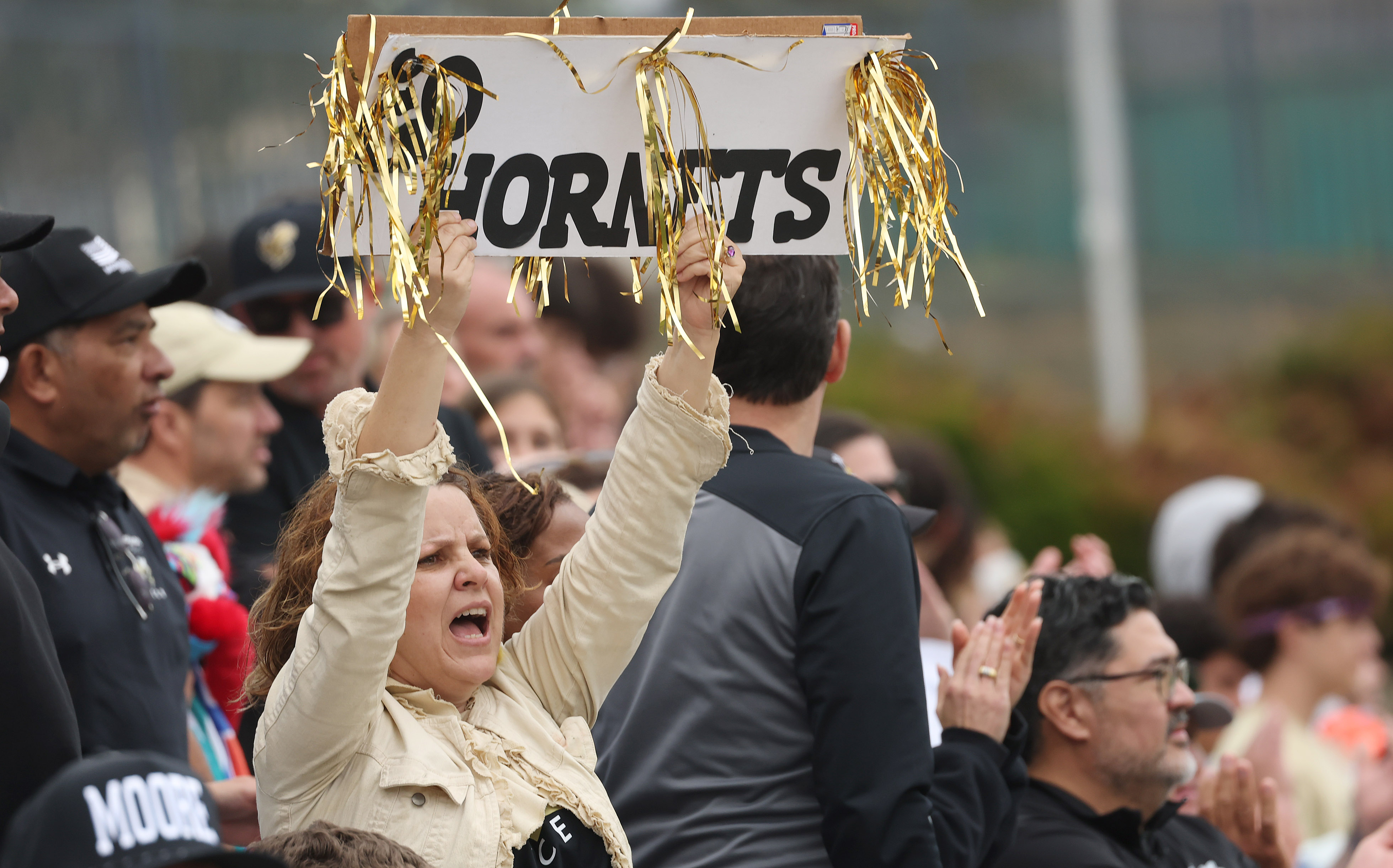 Bishop Moore Catholic High School soccer fans cheer during the...