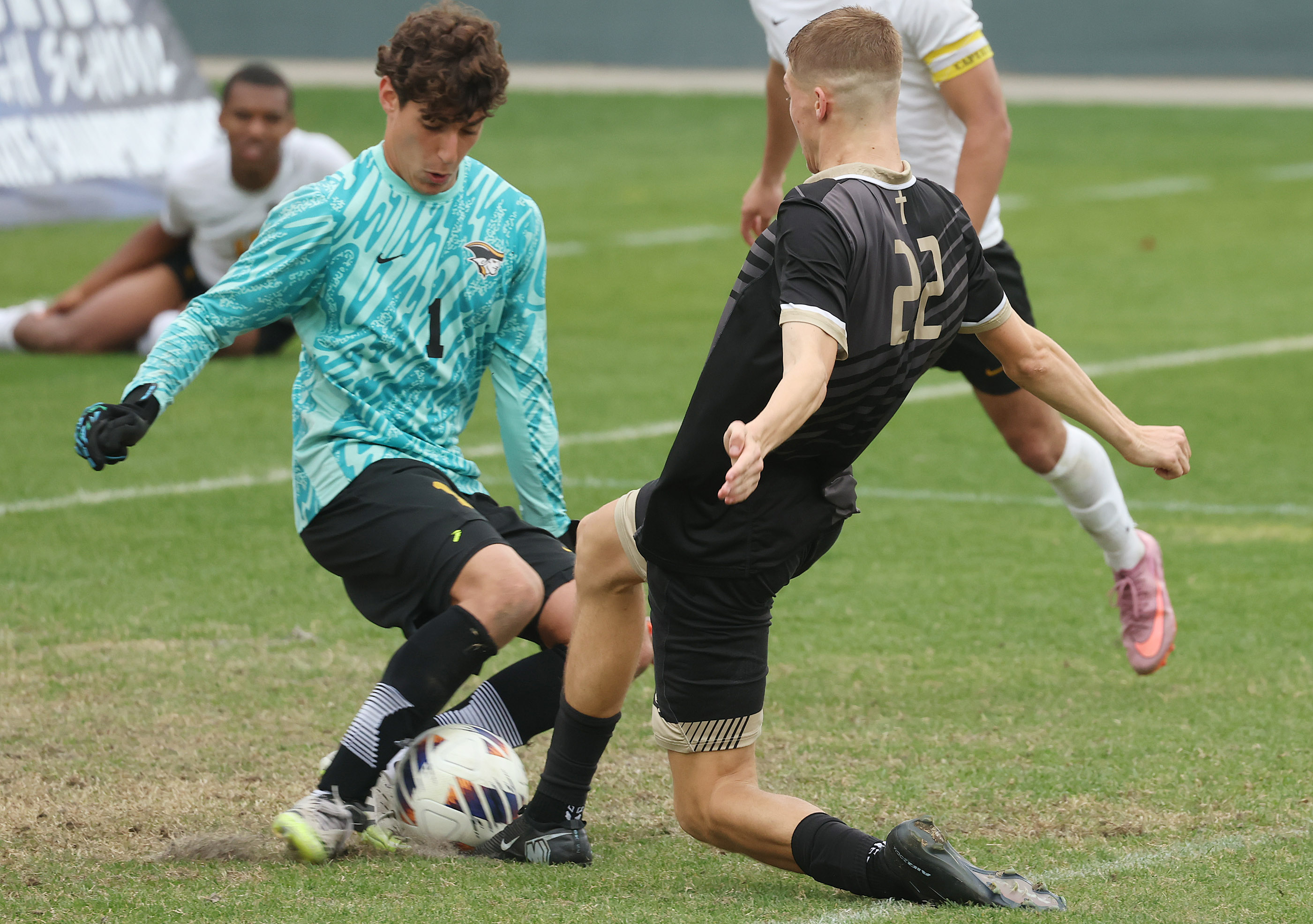 Bishop Moore Catholic High School soccer player Cooper Ball (22)...