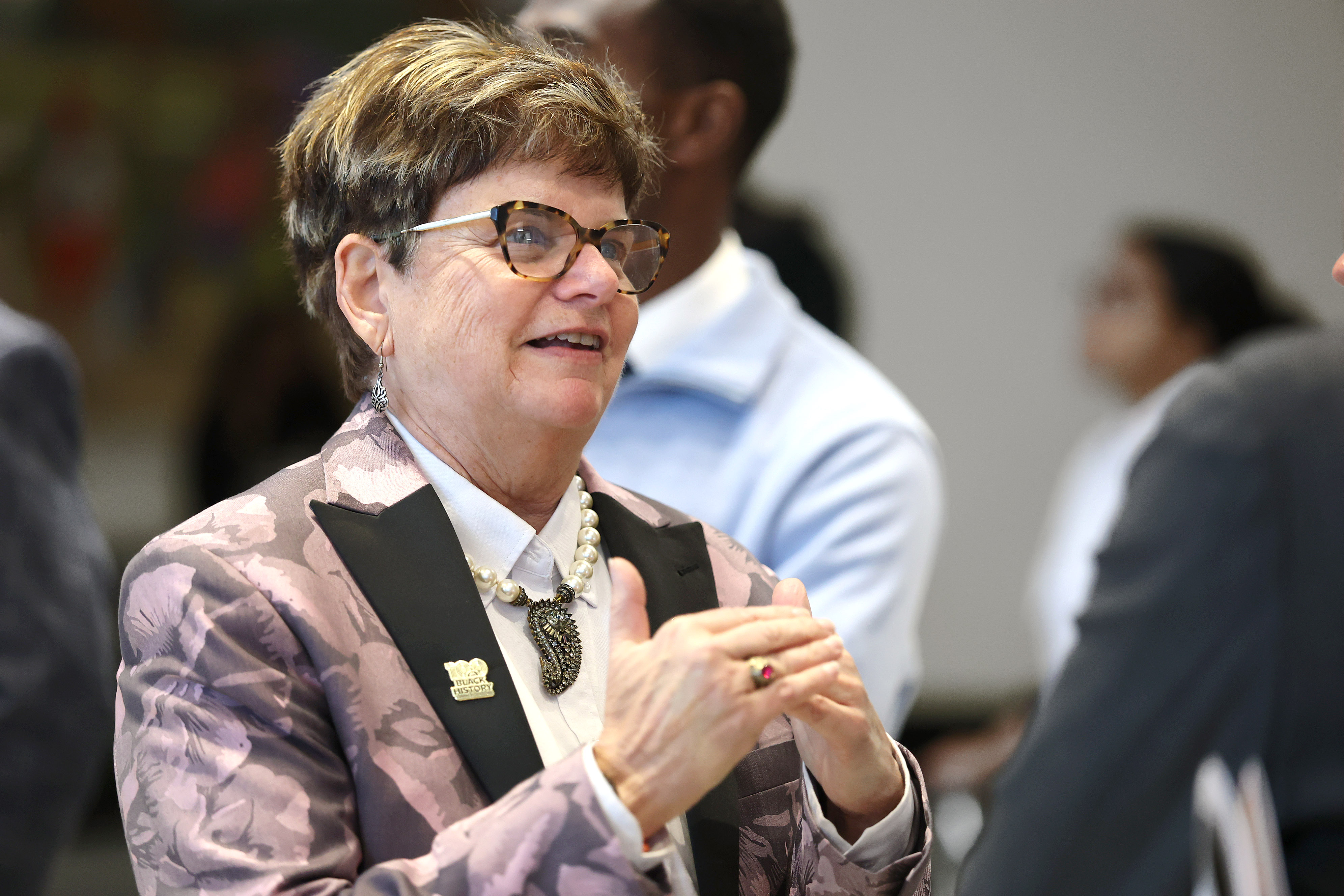 Patty Sheehan, Orlando City Commissioner, watches during the Opening Reception...
