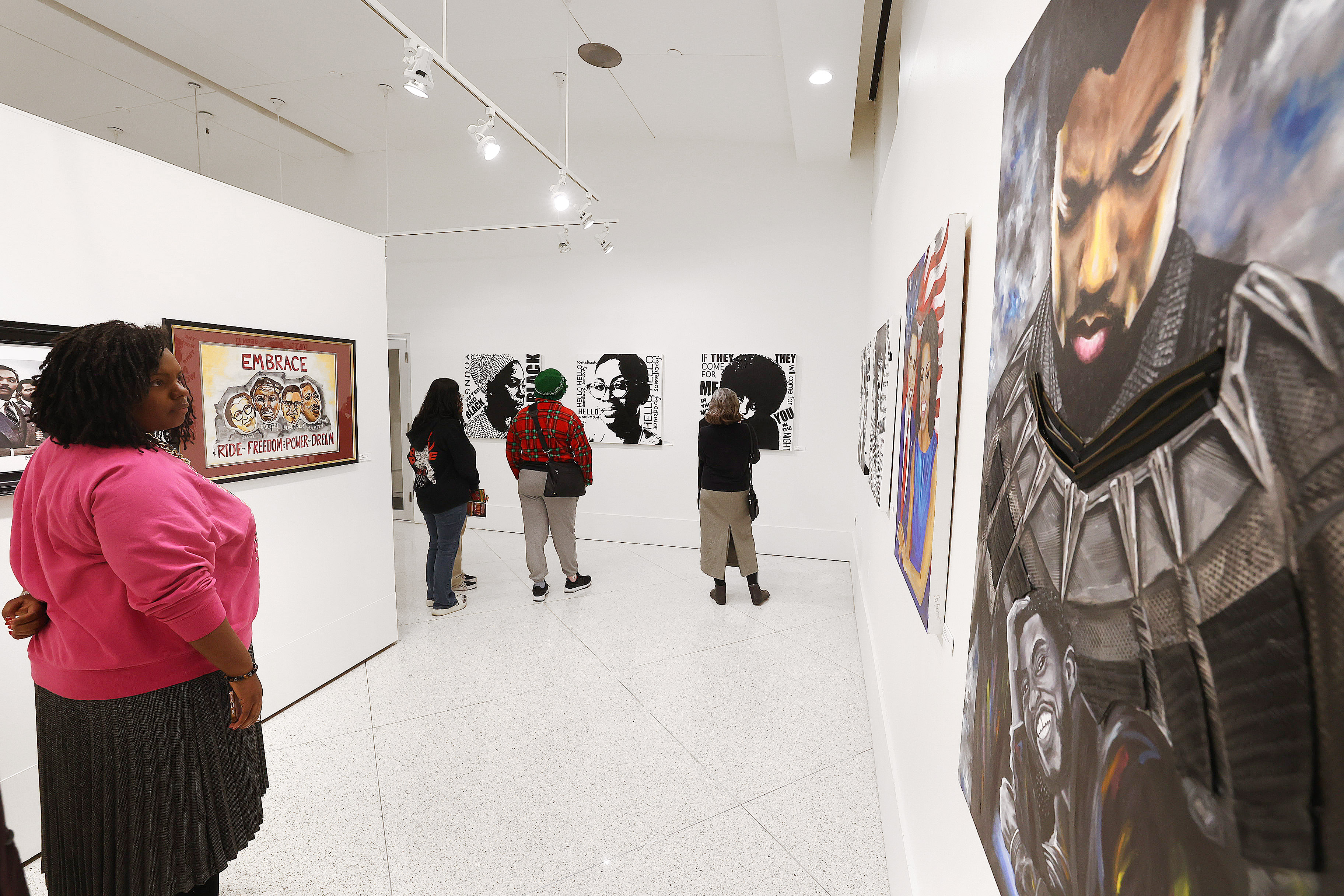 Visitors view art during the Opening Reception of the City...