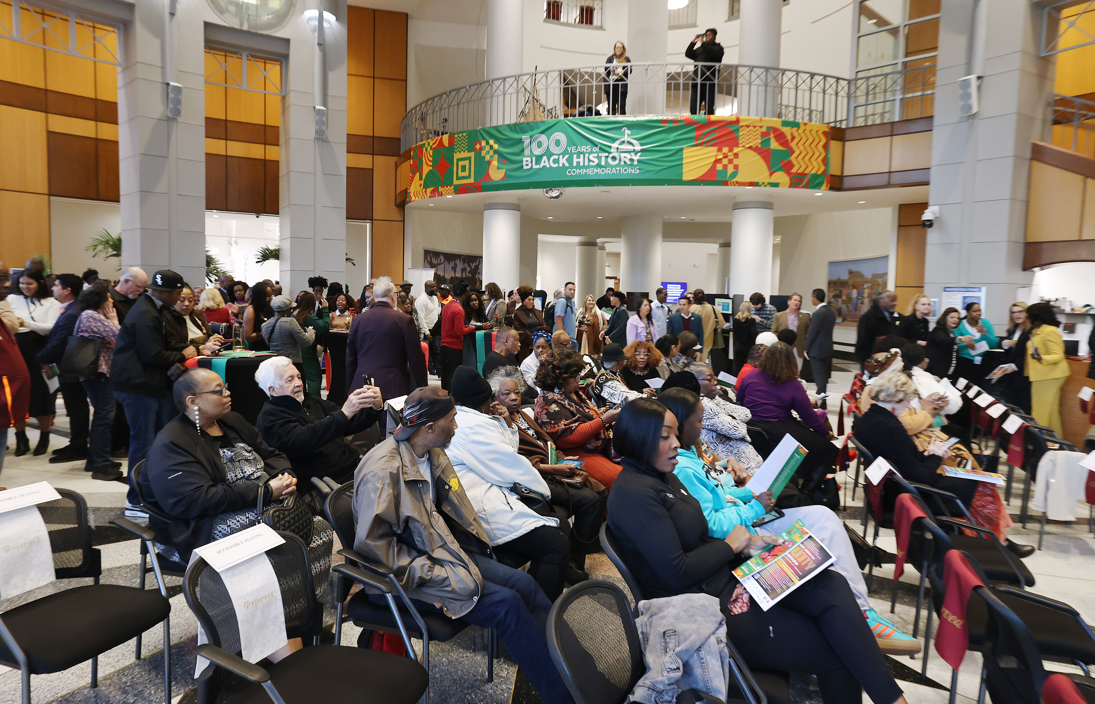 A packed house watches during the Opening Reception of the...