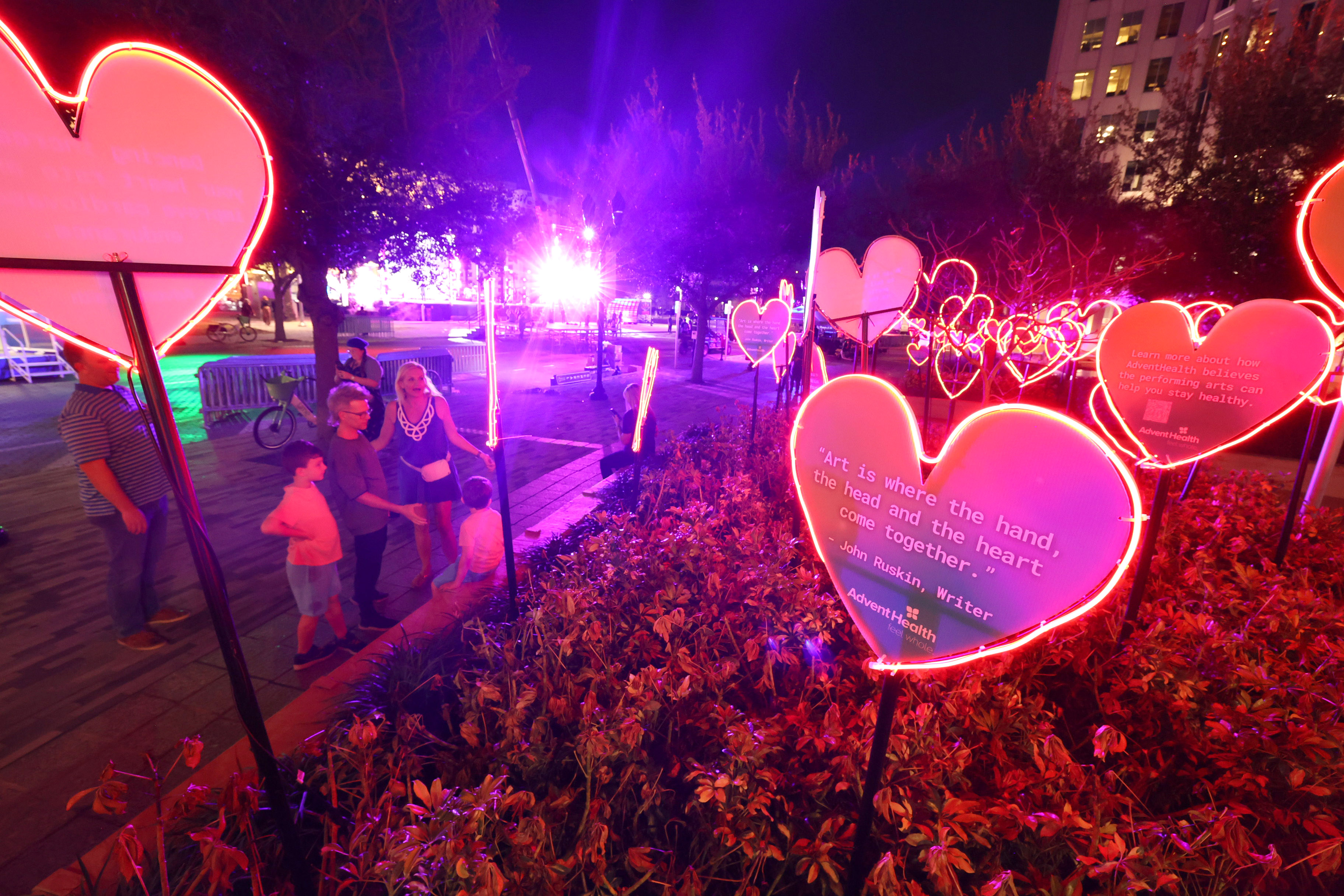 Lighted heart sculptures are on display during a tech rehearsal...