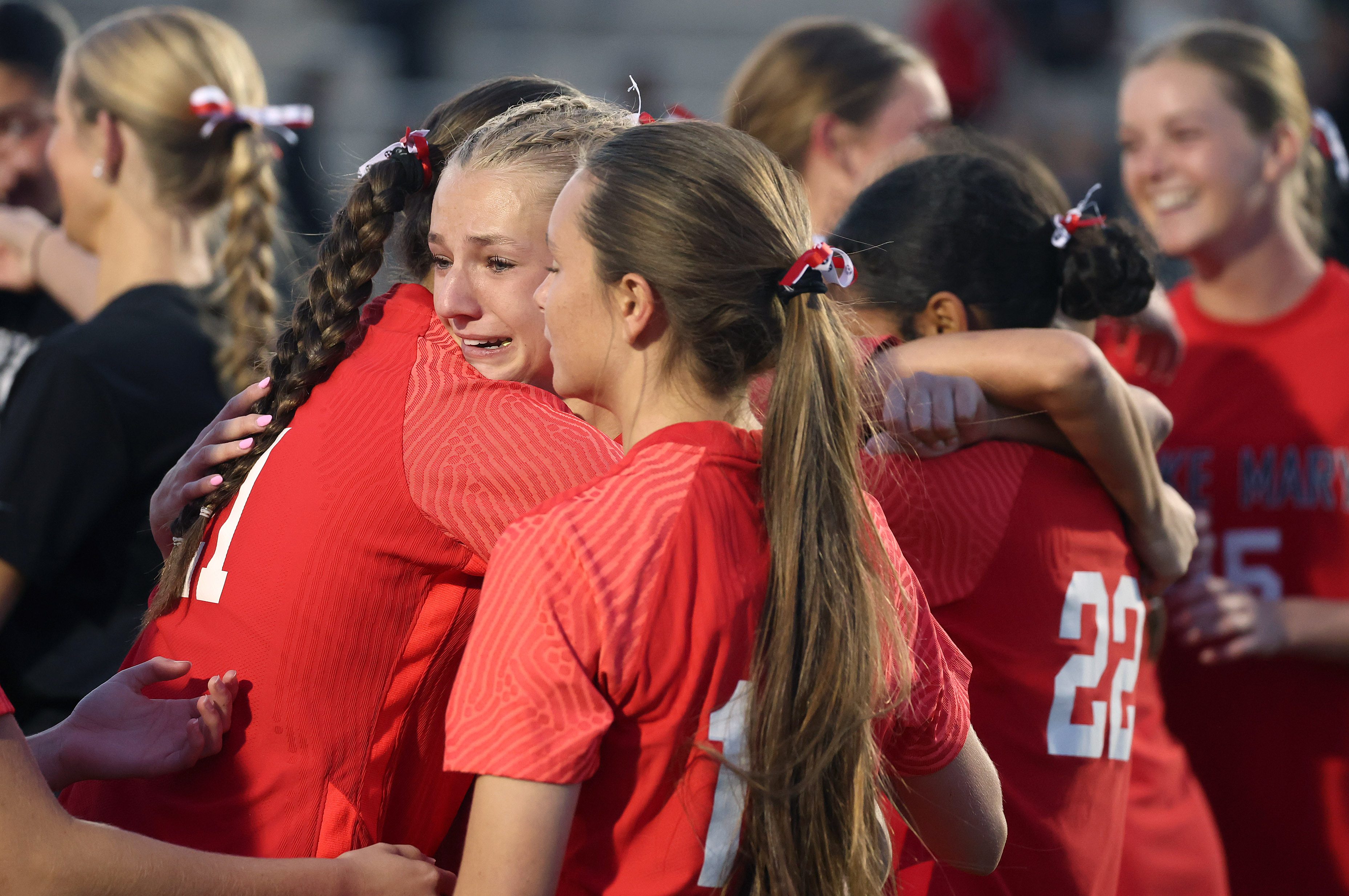 Lake Mary High girls soccer players celebrate after winning the...