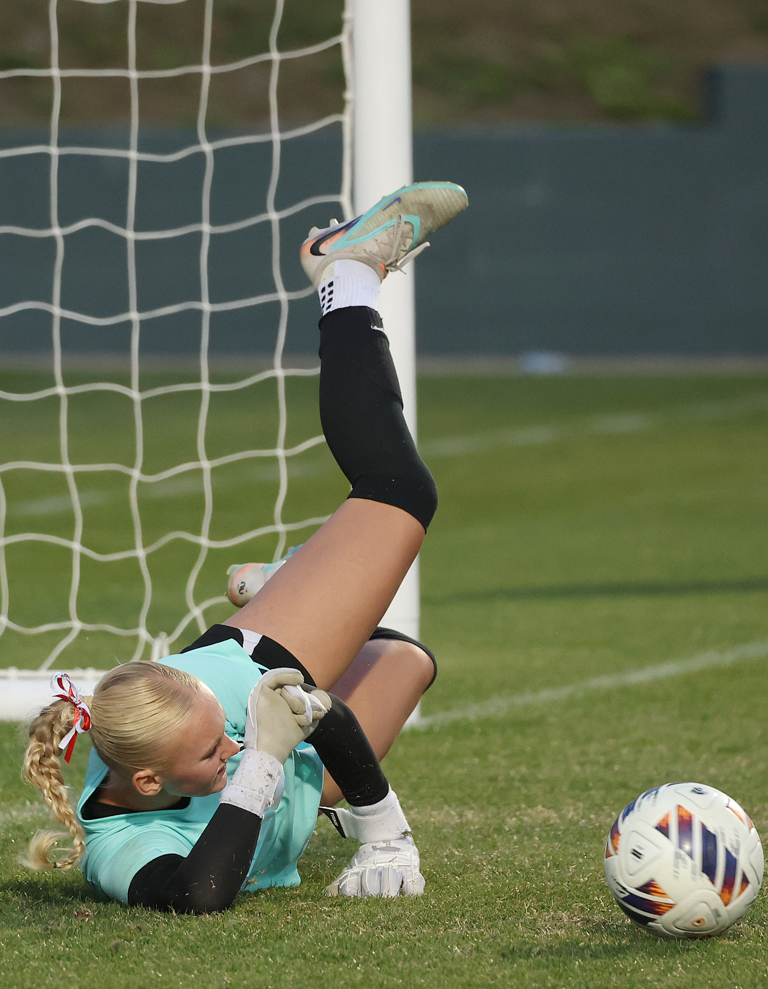 Lake Mary High goalkeeper Lily Ellis makes an athletic save...