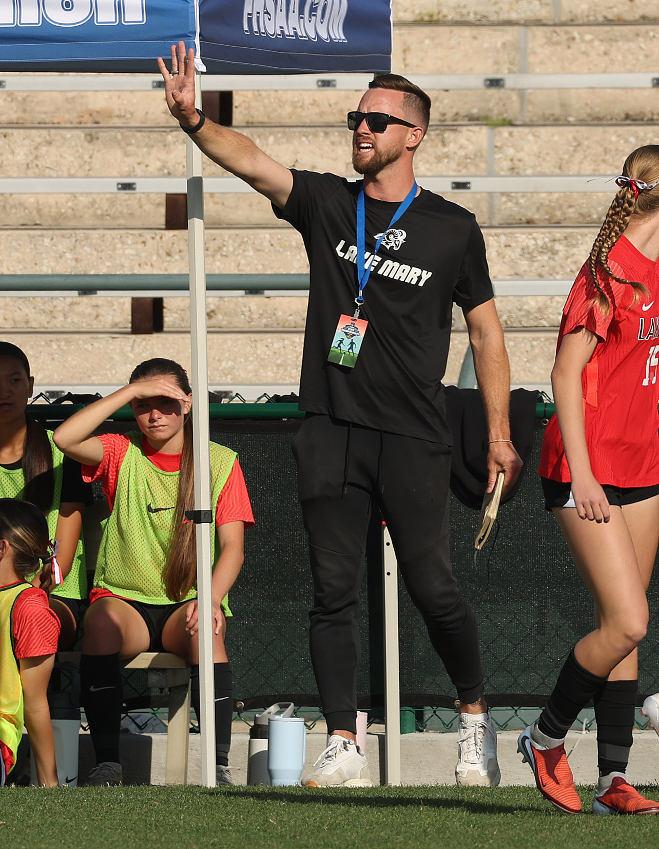Lake Mary High coach Christian Eiselle coaches during the FHSAA...