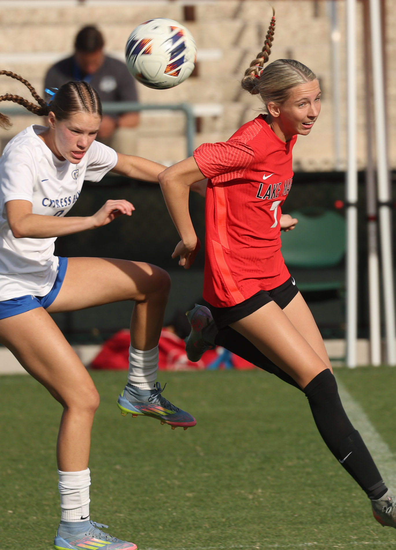 Lake Mary High player Sienna Sigurdsson (7) heads the ball...