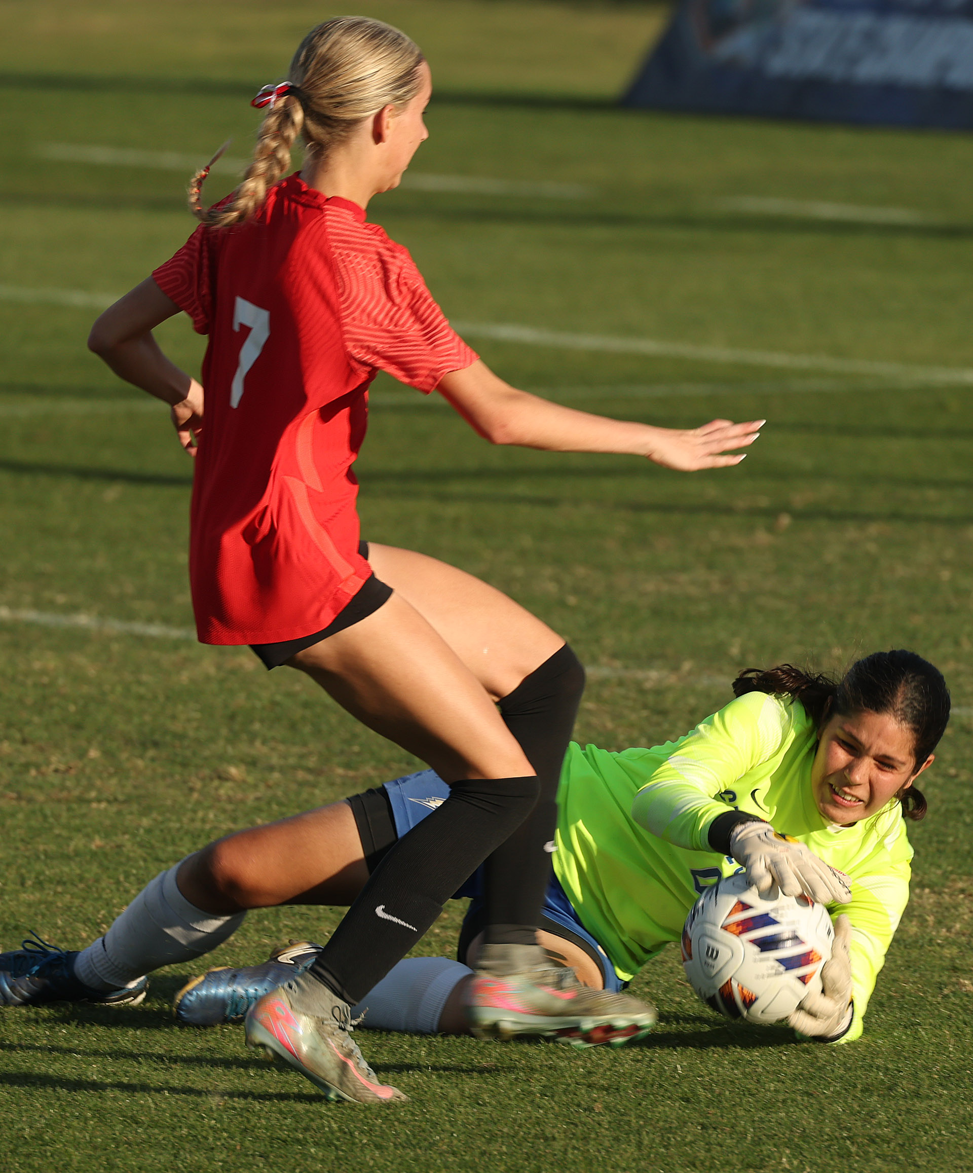 Lake Mary High player Siena Sigurdsson (7) has her kick...
