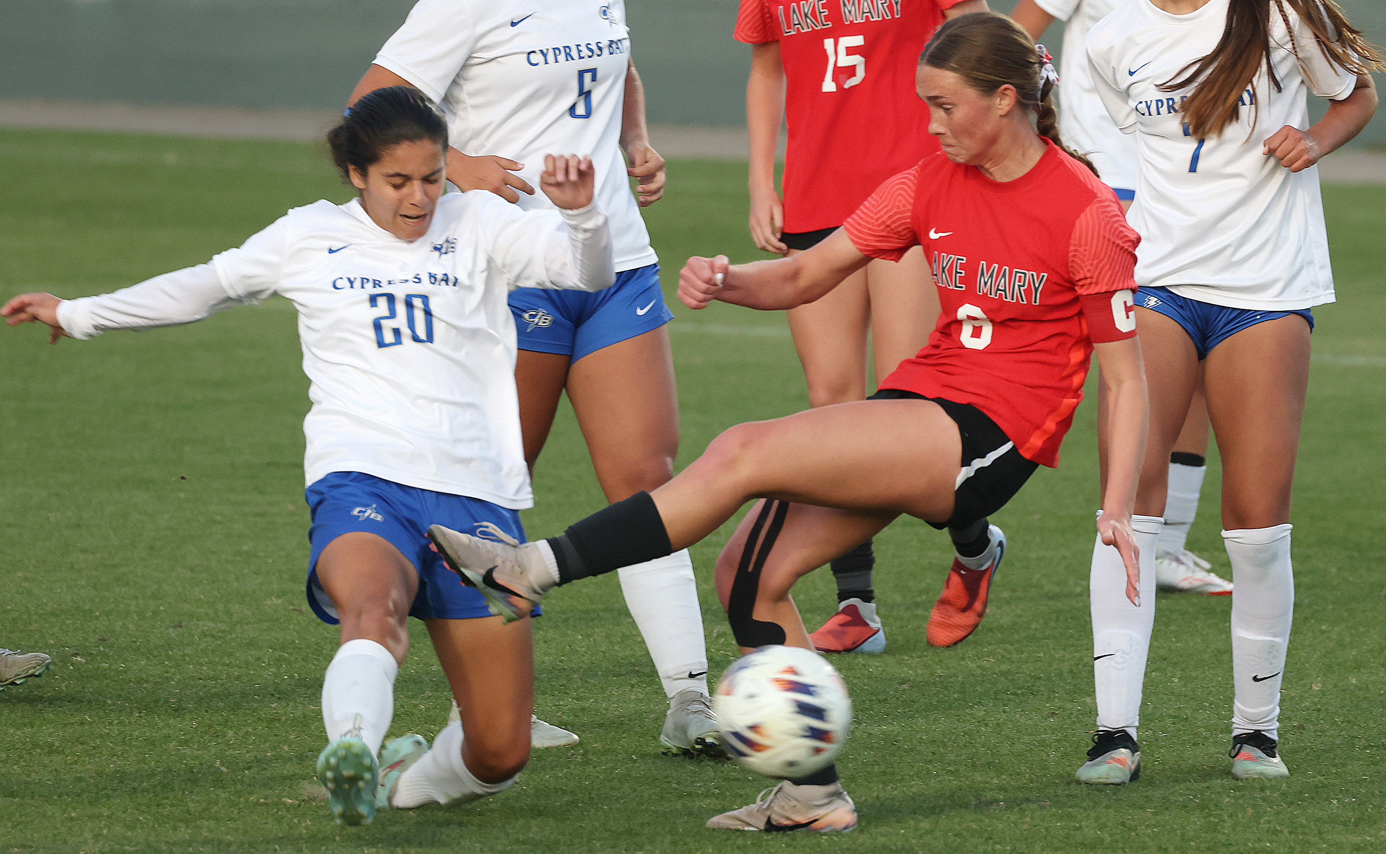 Lake Mary High player Ava McKay (8) tries to kick...