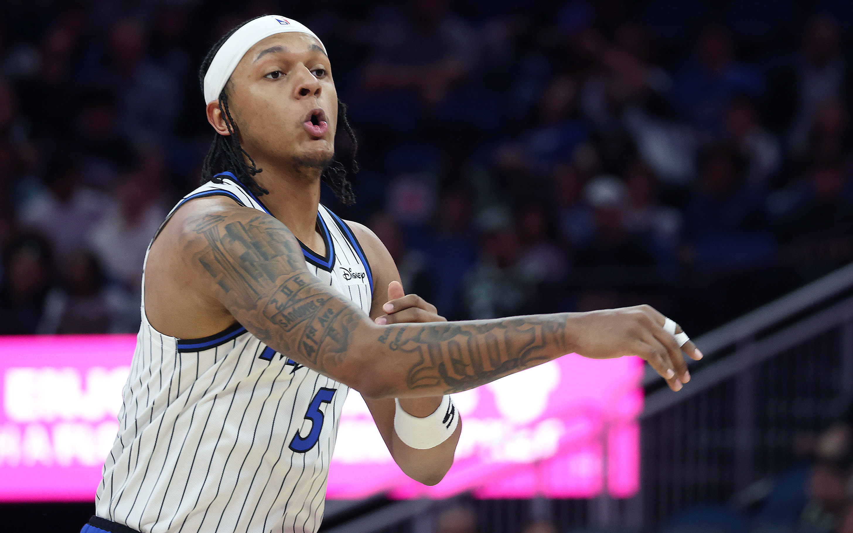 Orlando forward Paolo Banchero passes during the Milwaukee Bucks at...