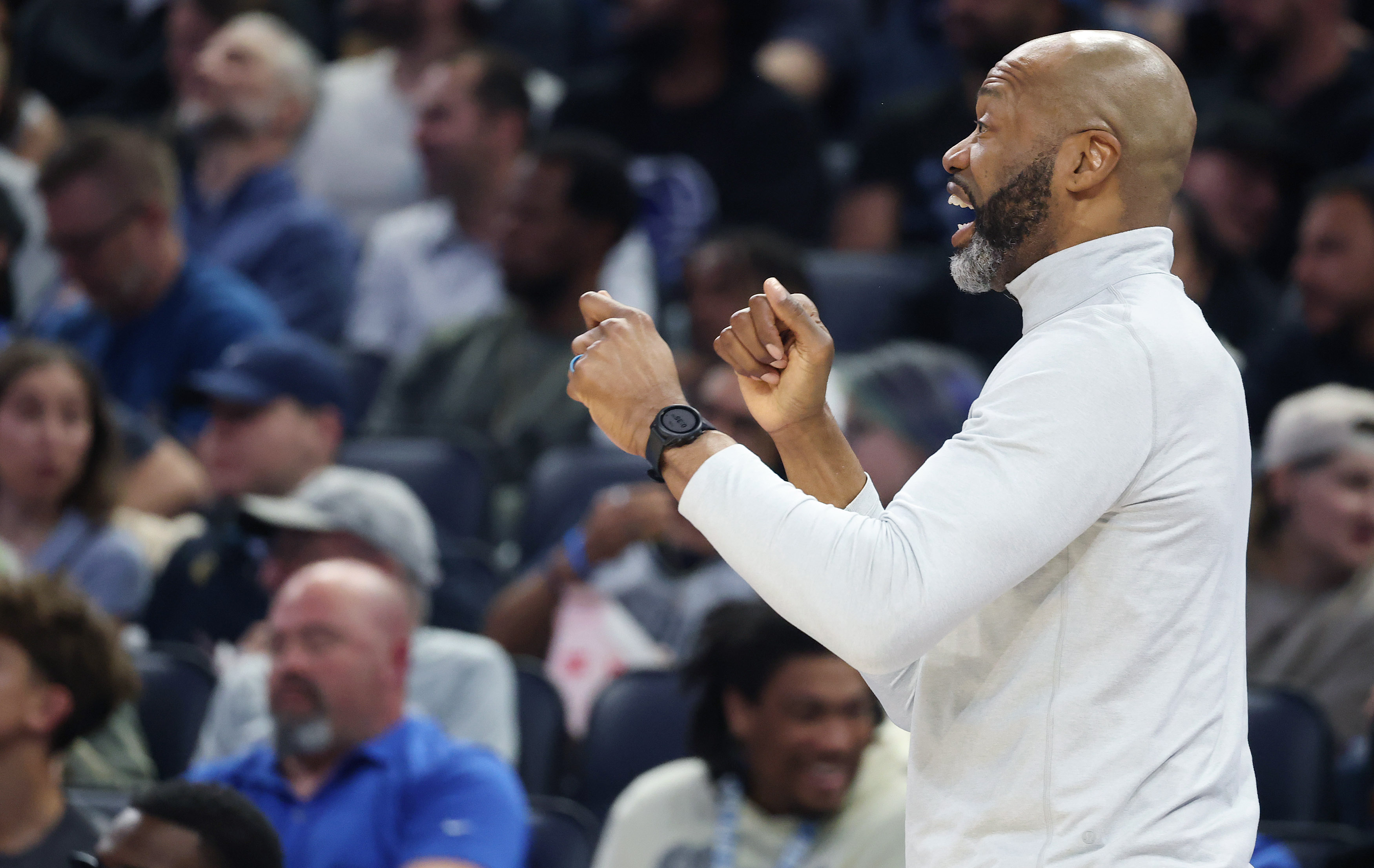 Orlando head coach Jamahl Mosley yells during the Milwaukee Bucks...