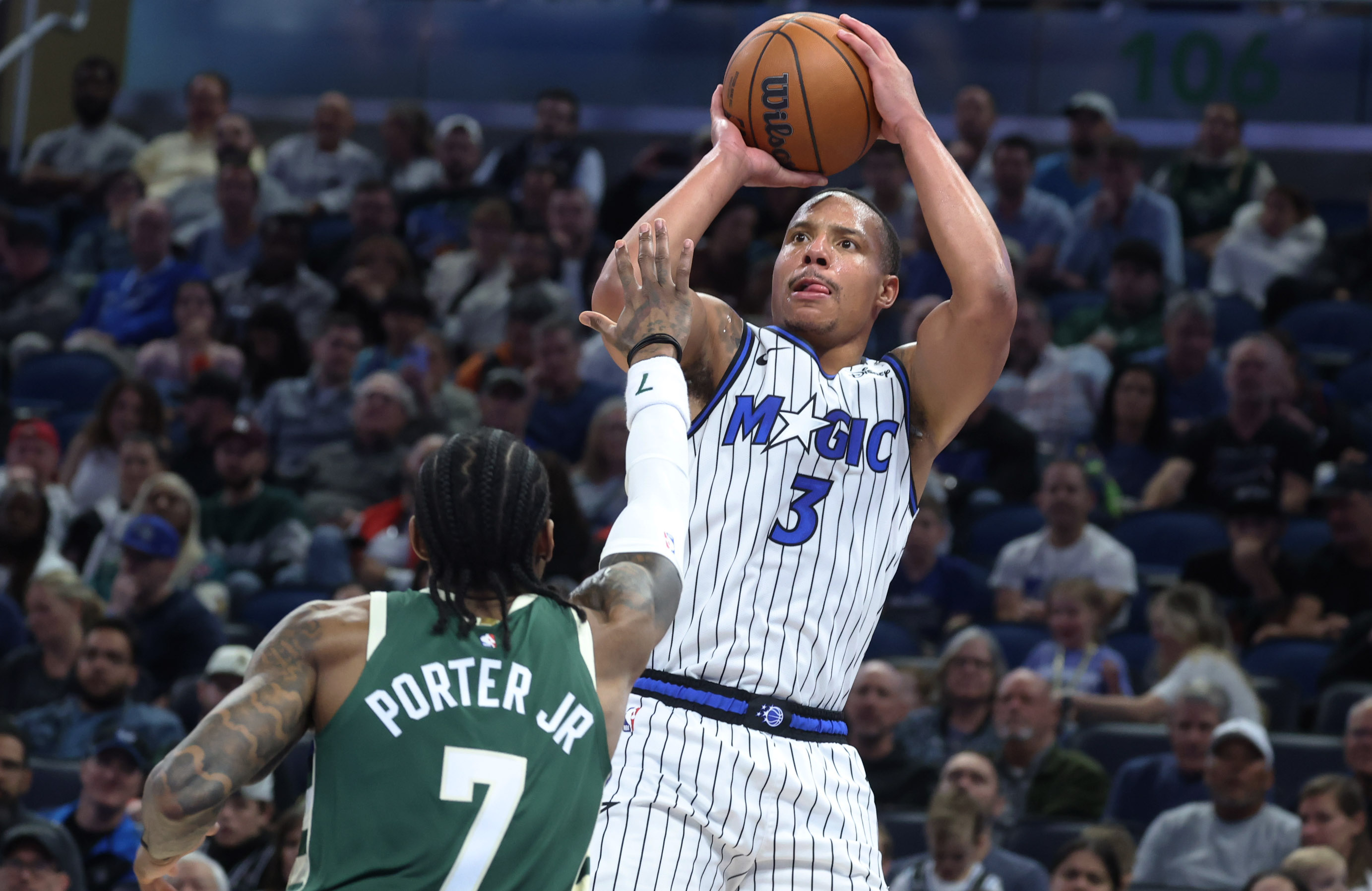 Orlando forward Desmond Bane (3) shoots a three point shot...