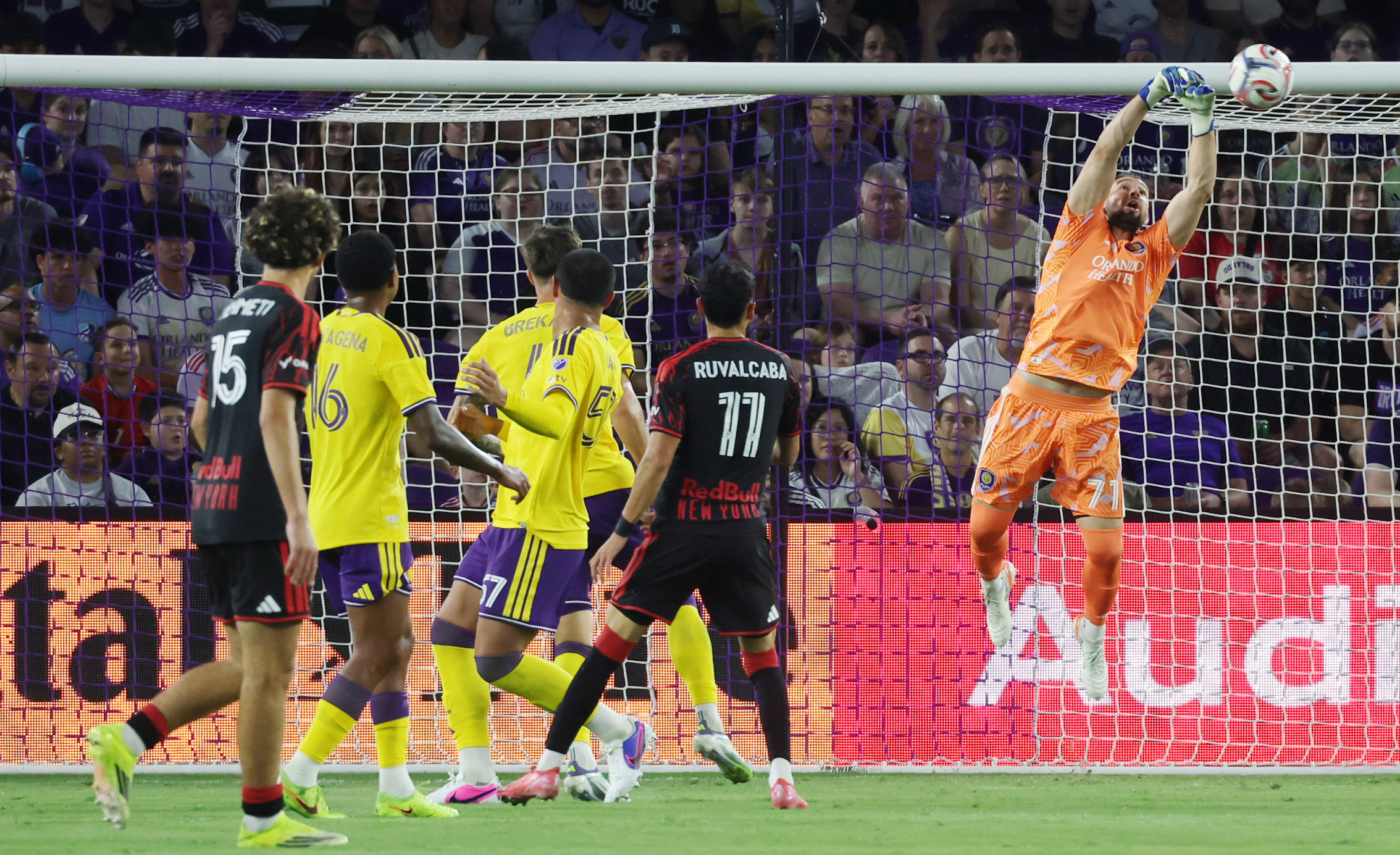 Orlando. City goalkeeper Maxime Crepeau (right) makles a save during...