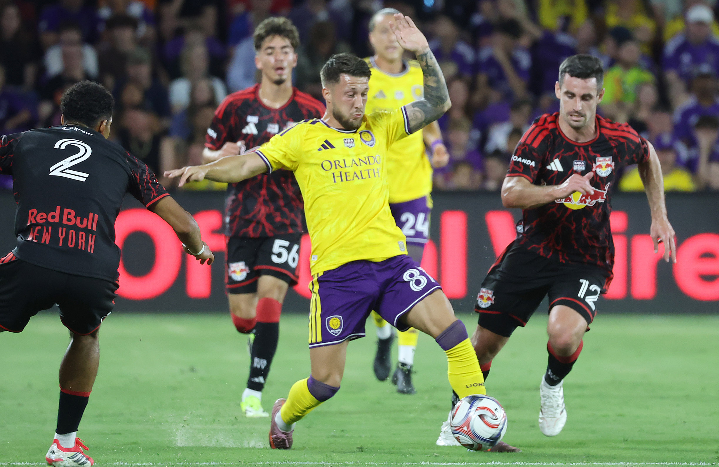 Orlando. City player Marco Pasalio (87) controls the ball during...