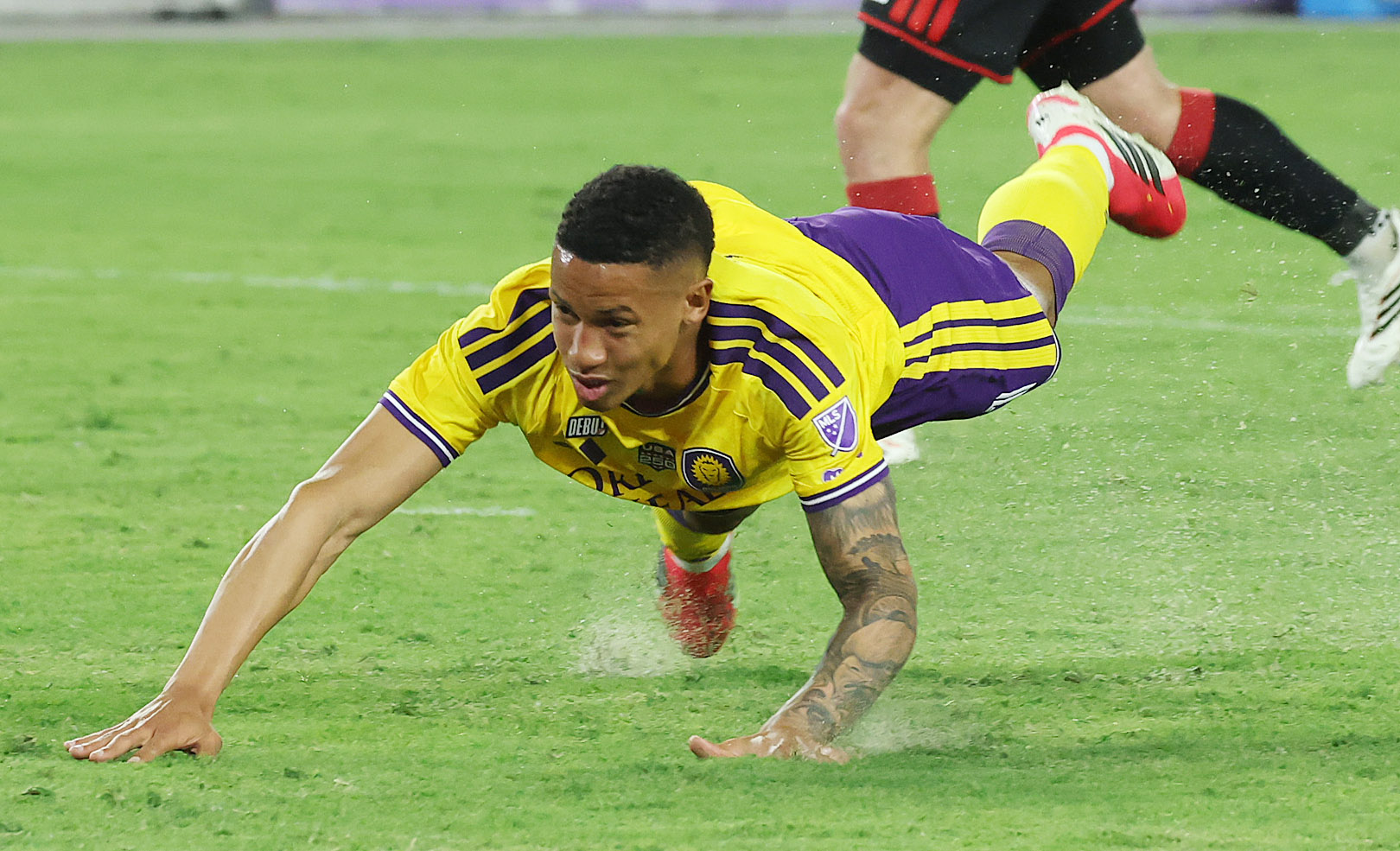 Orlando player Tiago falls while scoring a goal during the...