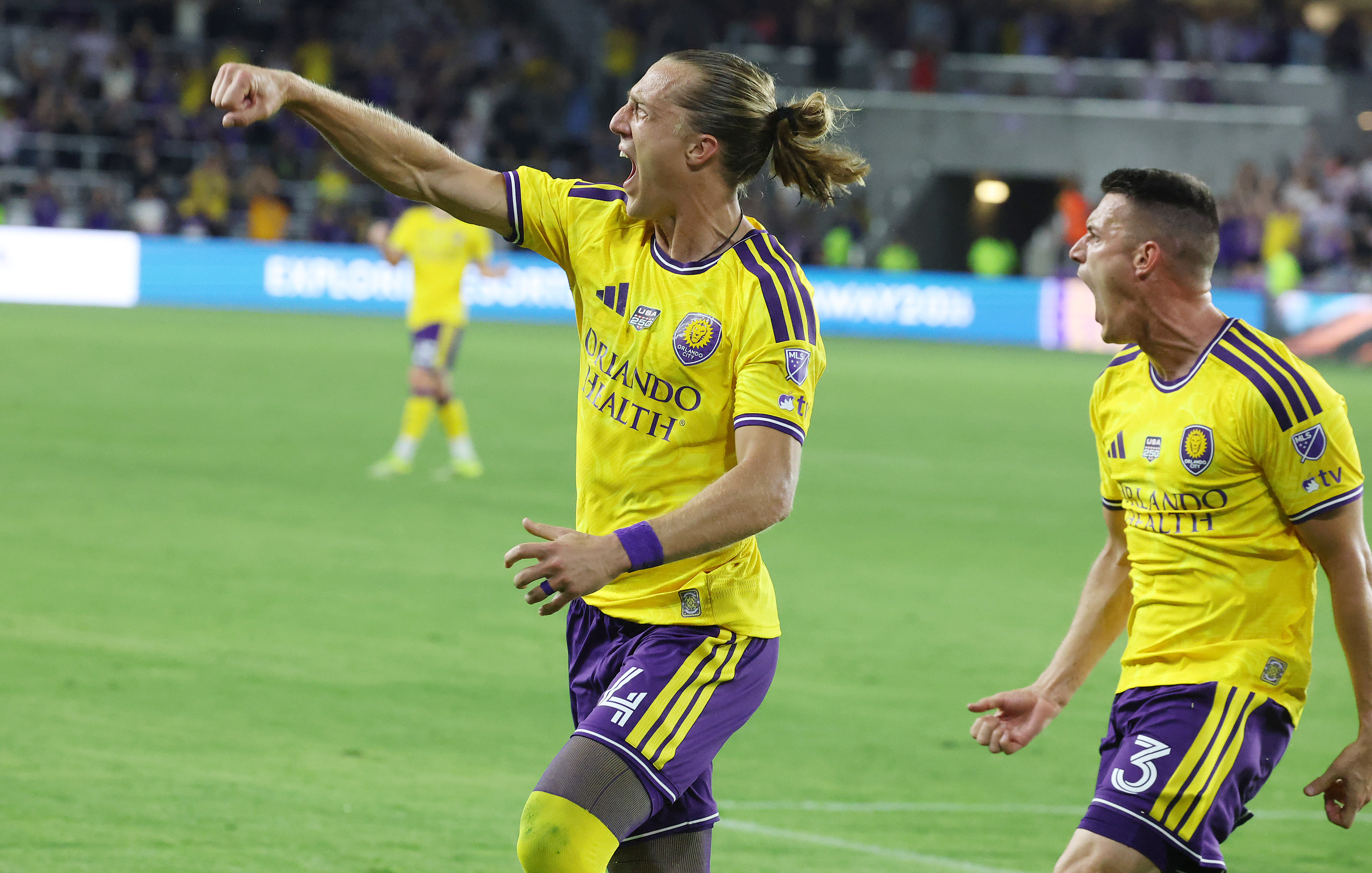 Orlando City players Griffin Dorsey (24) and Adrian Marin (3)...