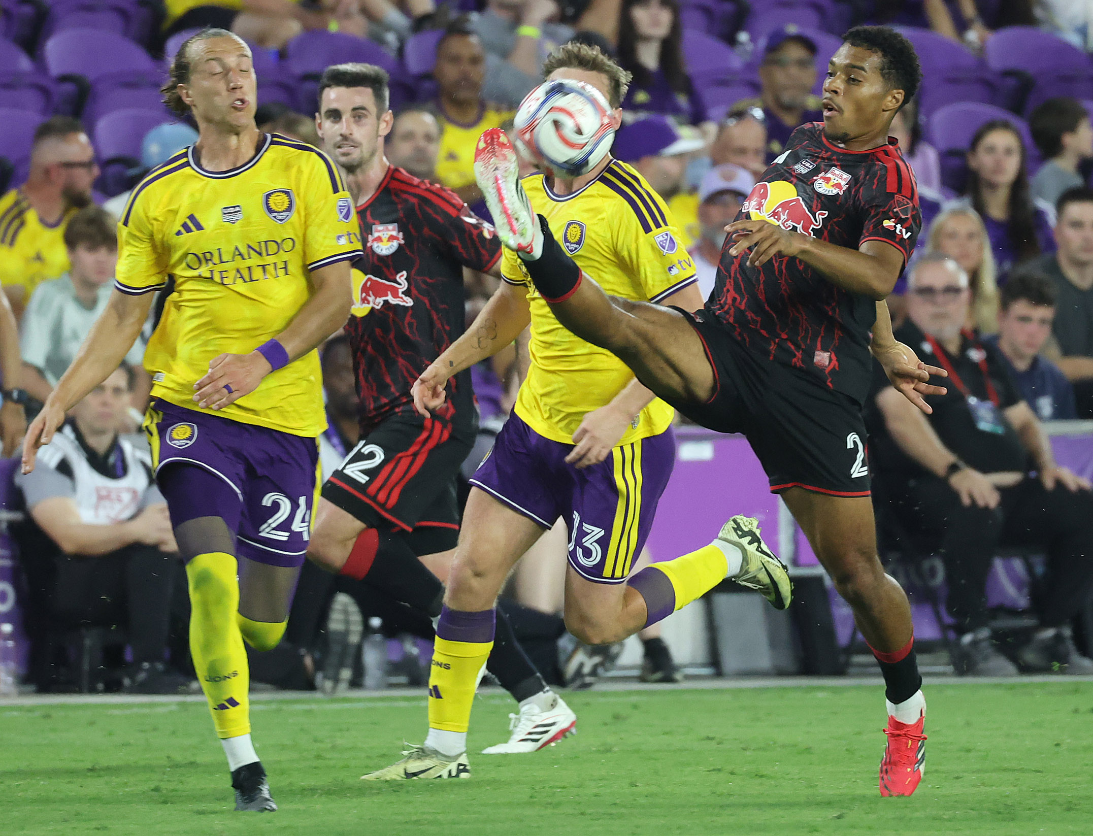 New York player Che (2) controls the ball during the...