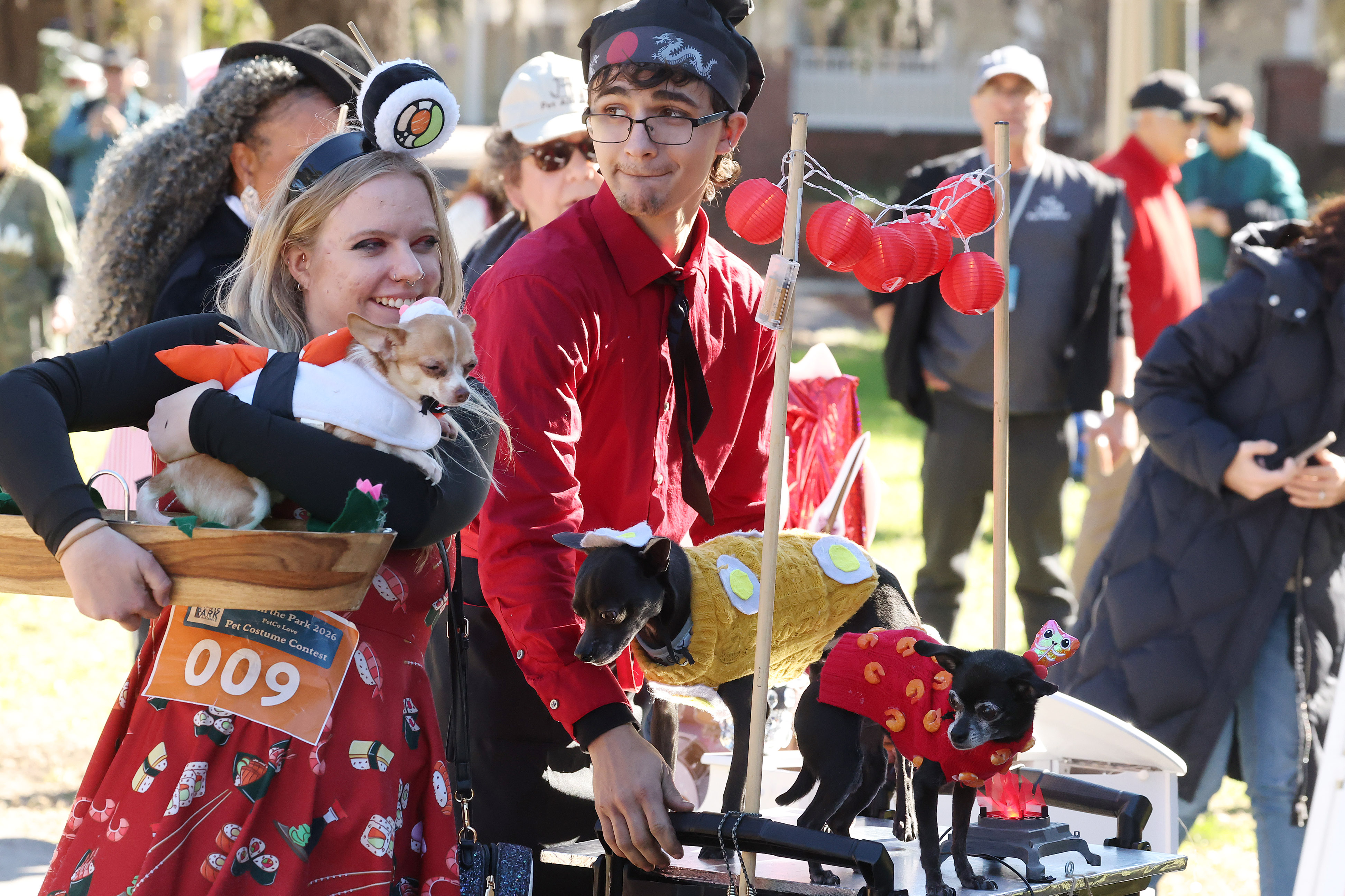 Madi Sparks, left, and her three dogs: 