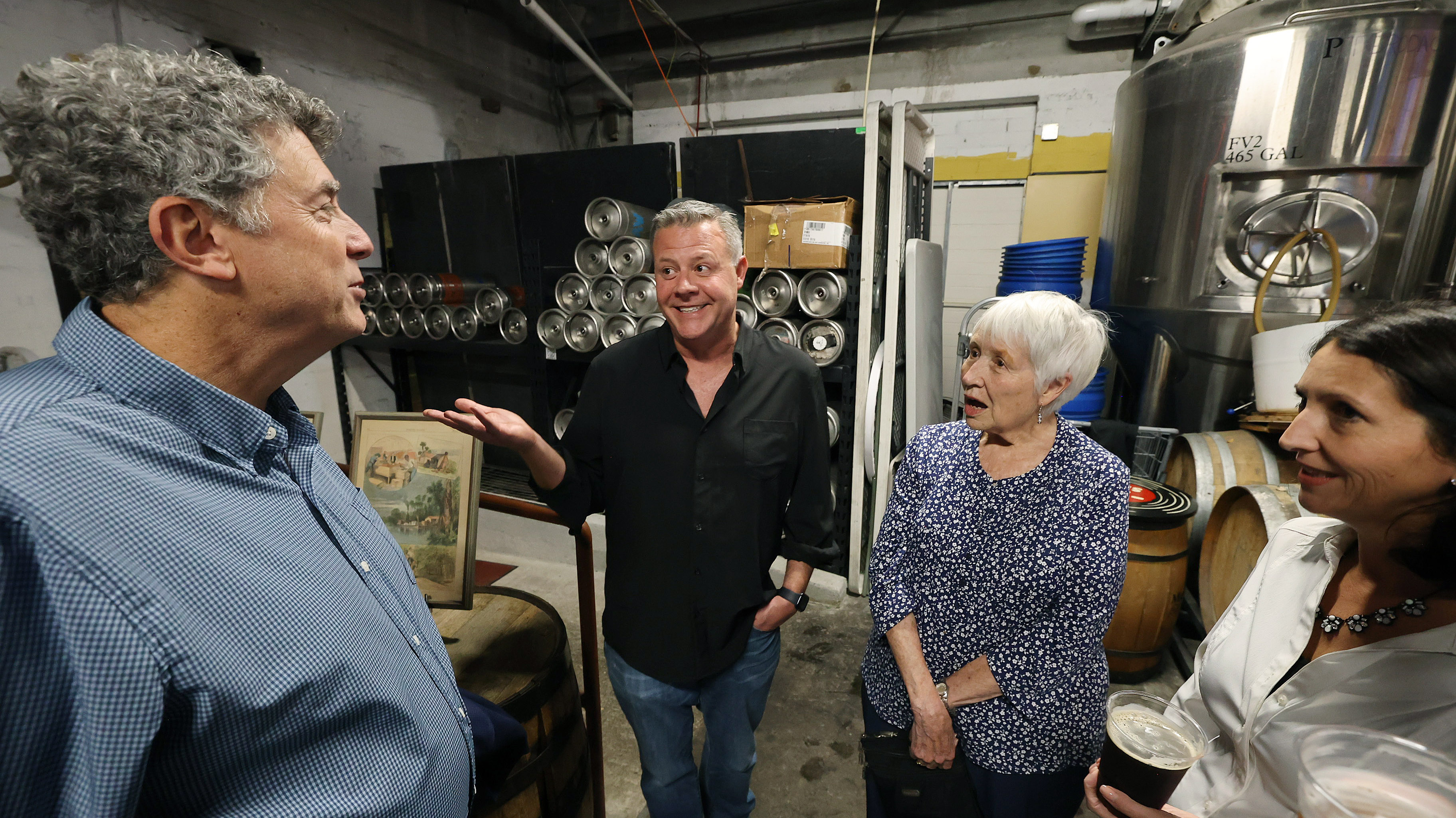 Orlando Sentinel executive editor Roger Simmons, left, and columnist Scott...