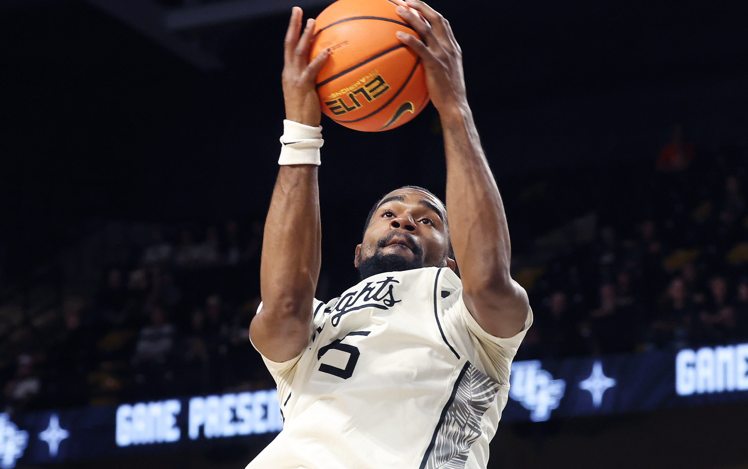 UCF forwrard Devan Cambridge pulls down a rebound during the...