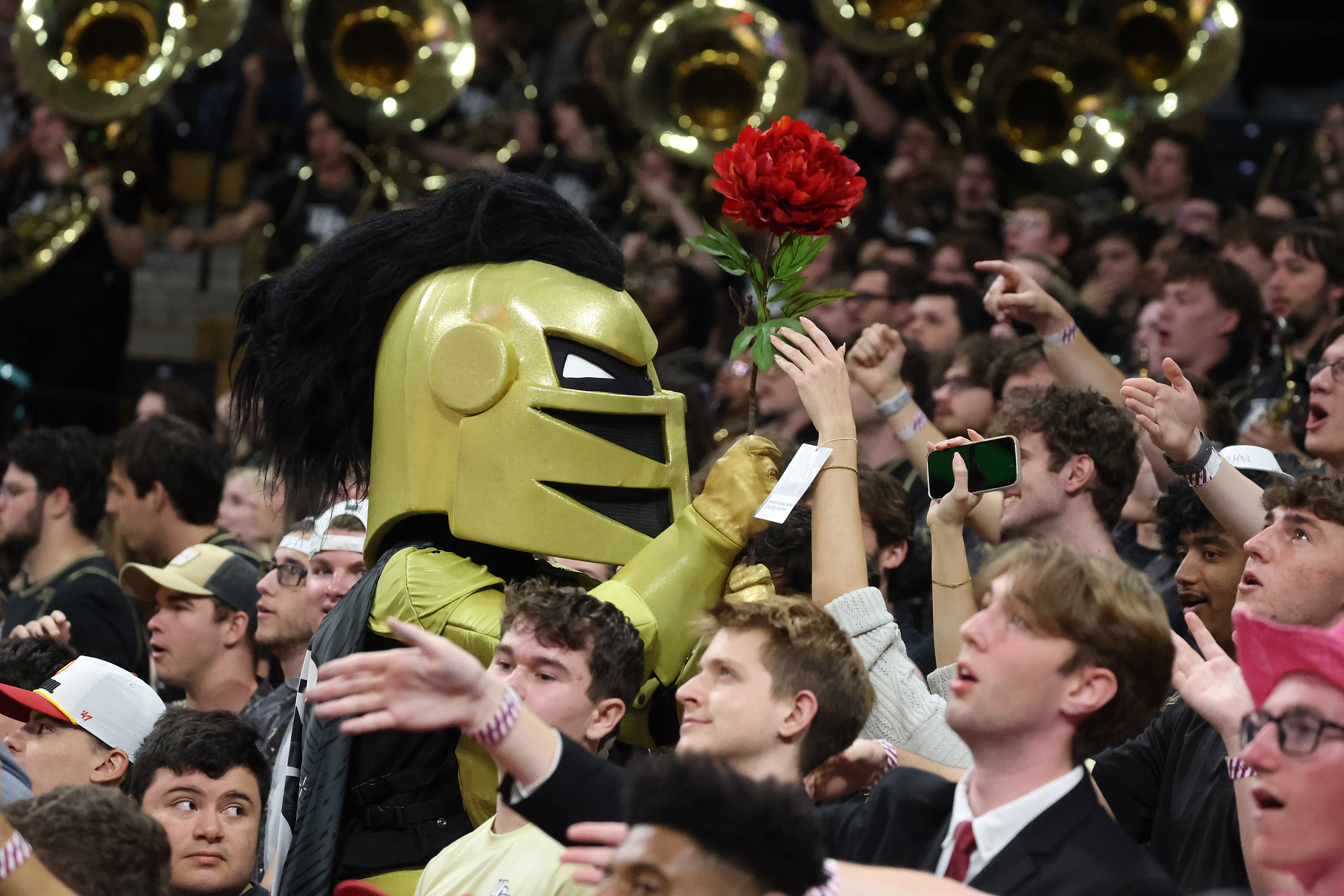 The UCF mascot gets flowers on Valentines Day during the...