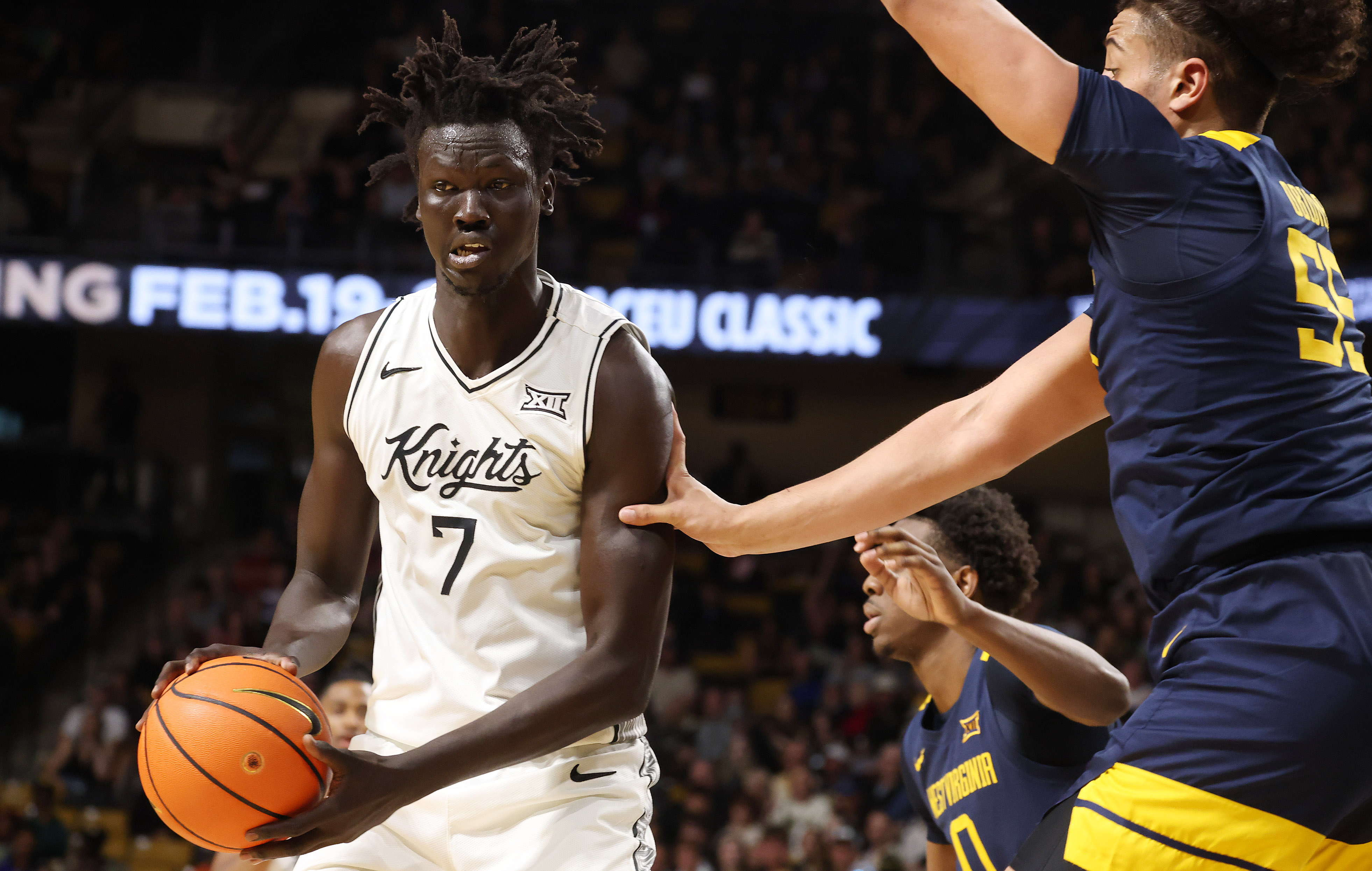 UCF center John Bol (7) looks to pass during the...
