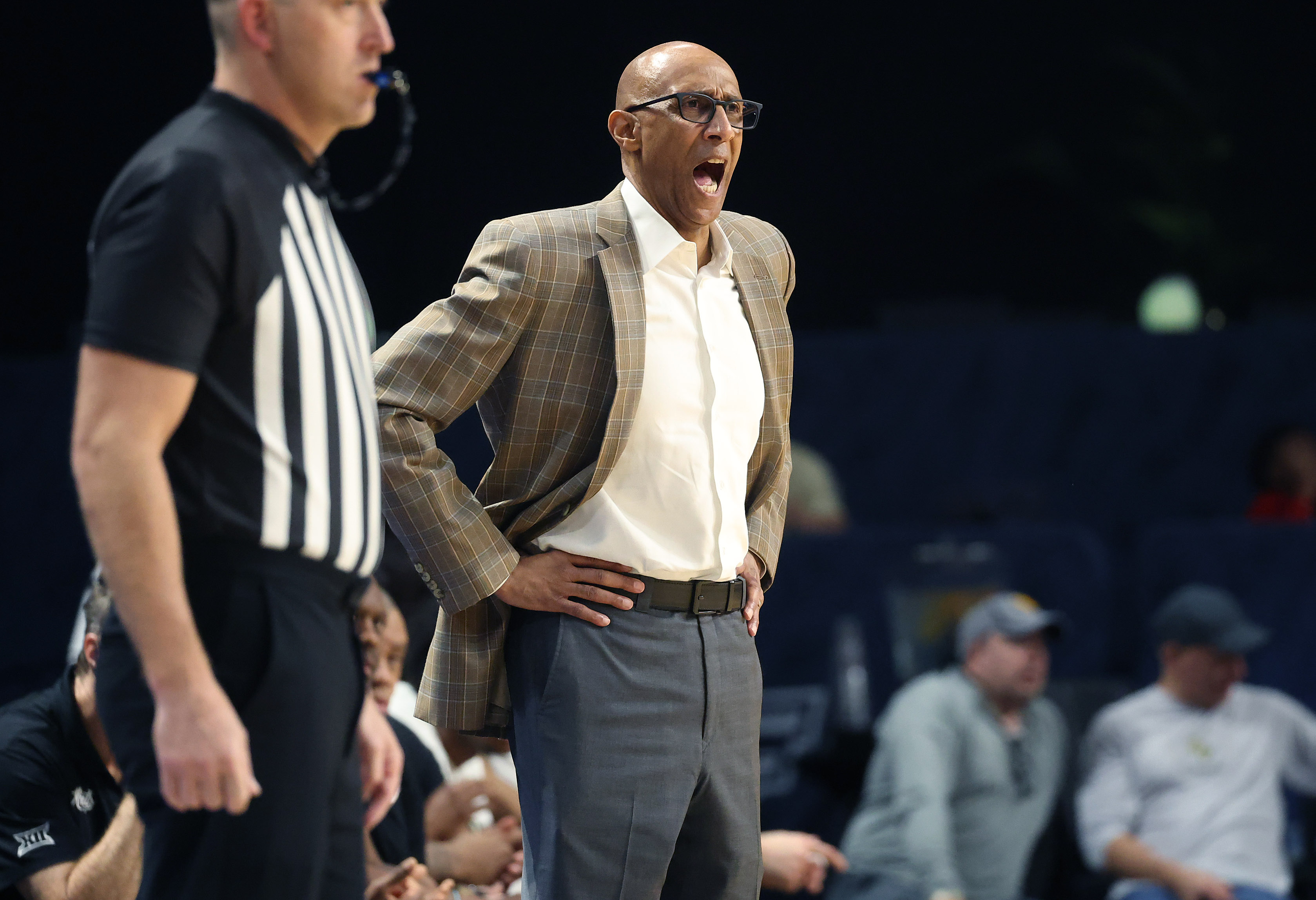 UCF coach Johnny Dawkins yells during the West Virginia at...