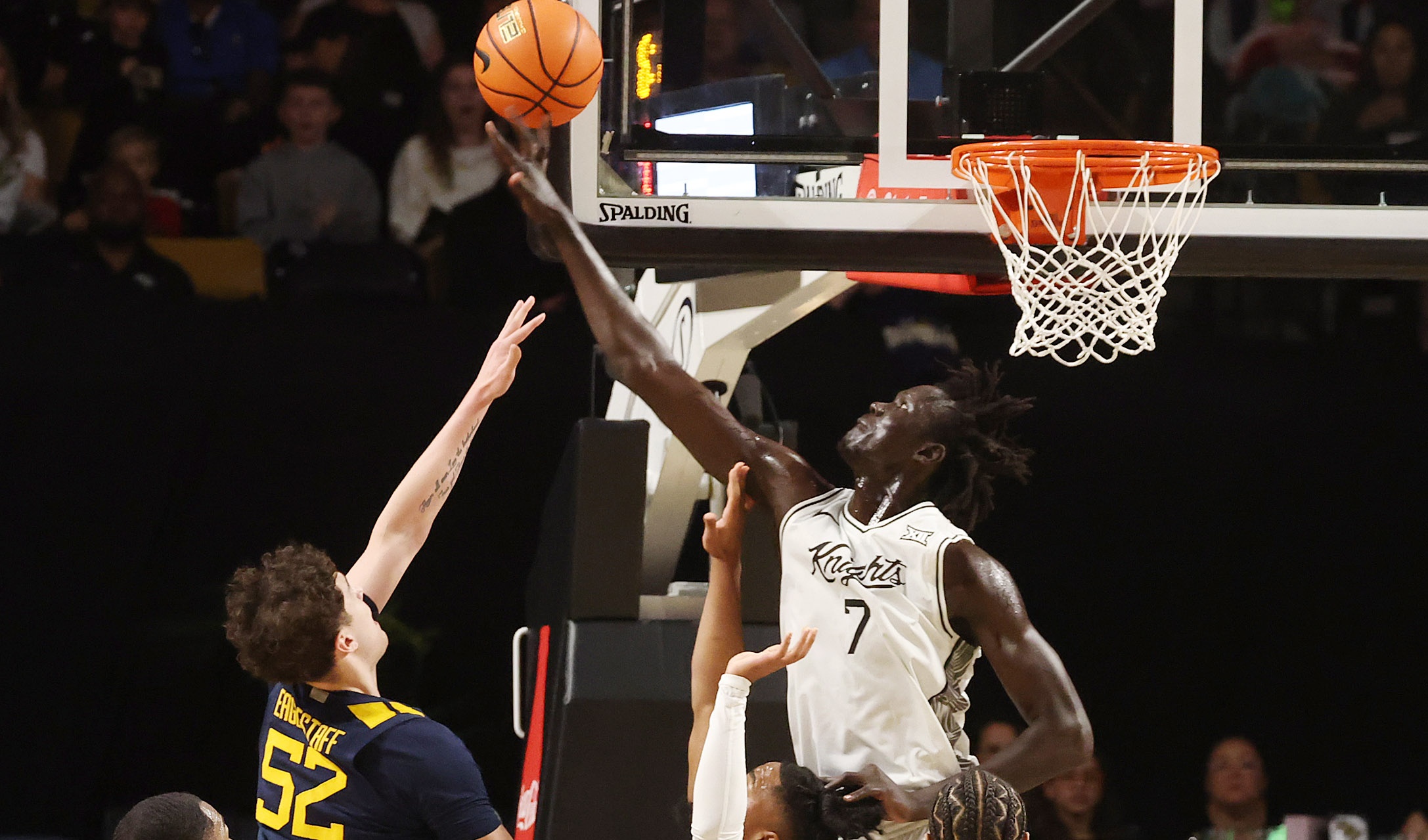 UCF center John Bol (7) blocks a shot by West...