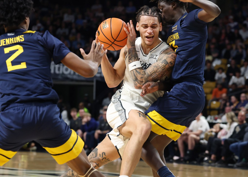 UCF can't withstand late surge by West Virginia