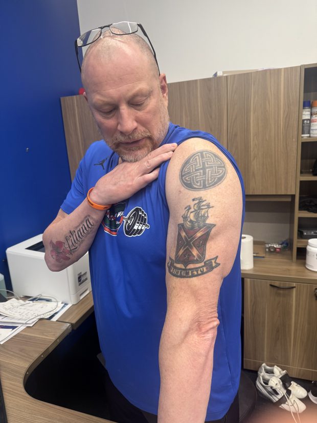 Florida strength coach Rusty Whitt has two tattoos on his right are to honor Josh Townsend, Whitt's roommate and fellow Green Beret who died Afghanistan. 'He liked Jameson Whiskey ... and a Celtic knot because he was a big Irish guy."