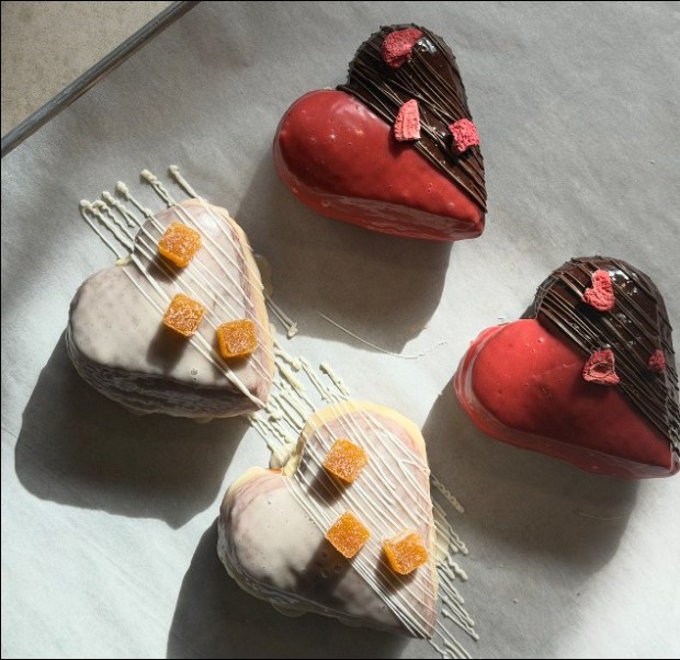 Spread love via doughnuts from The Salty. This year's flavors: Passionfruit & Vanilla and Chocolate-Covered Strawberry Heart. (Photos courtesy The Salty)