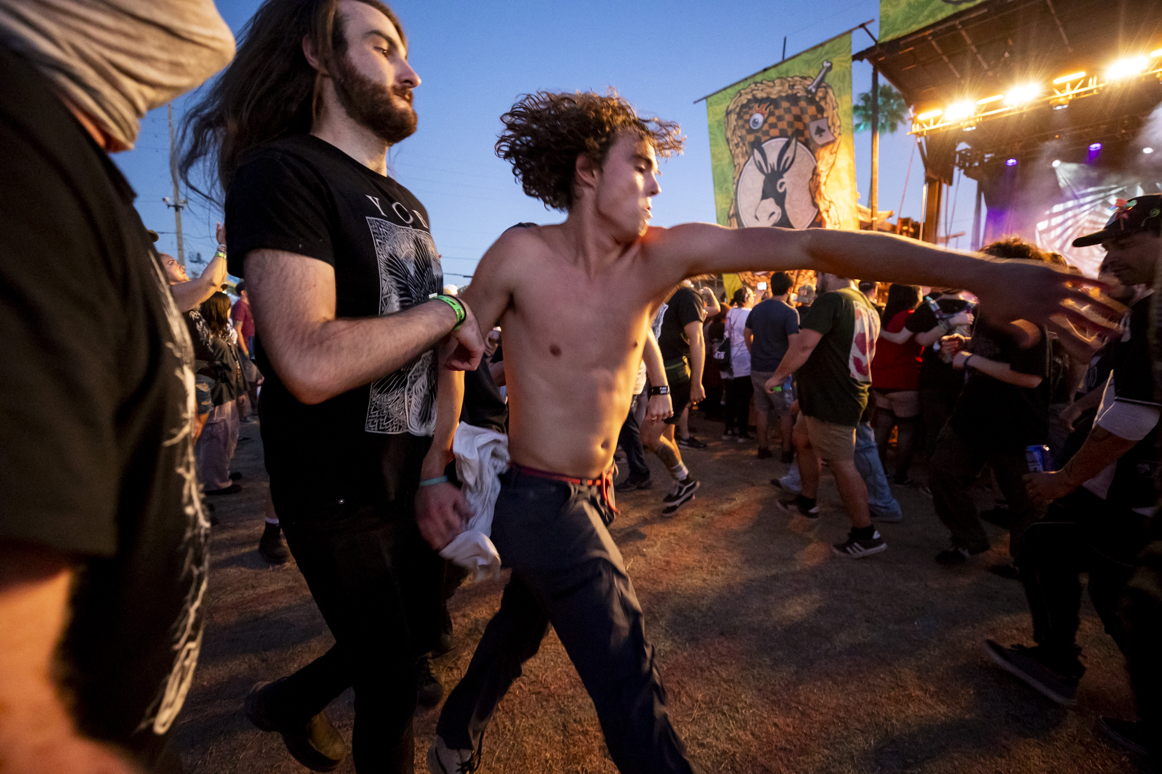 Fans form a mosh pit while Dinosaur Pile-Up performs at...
