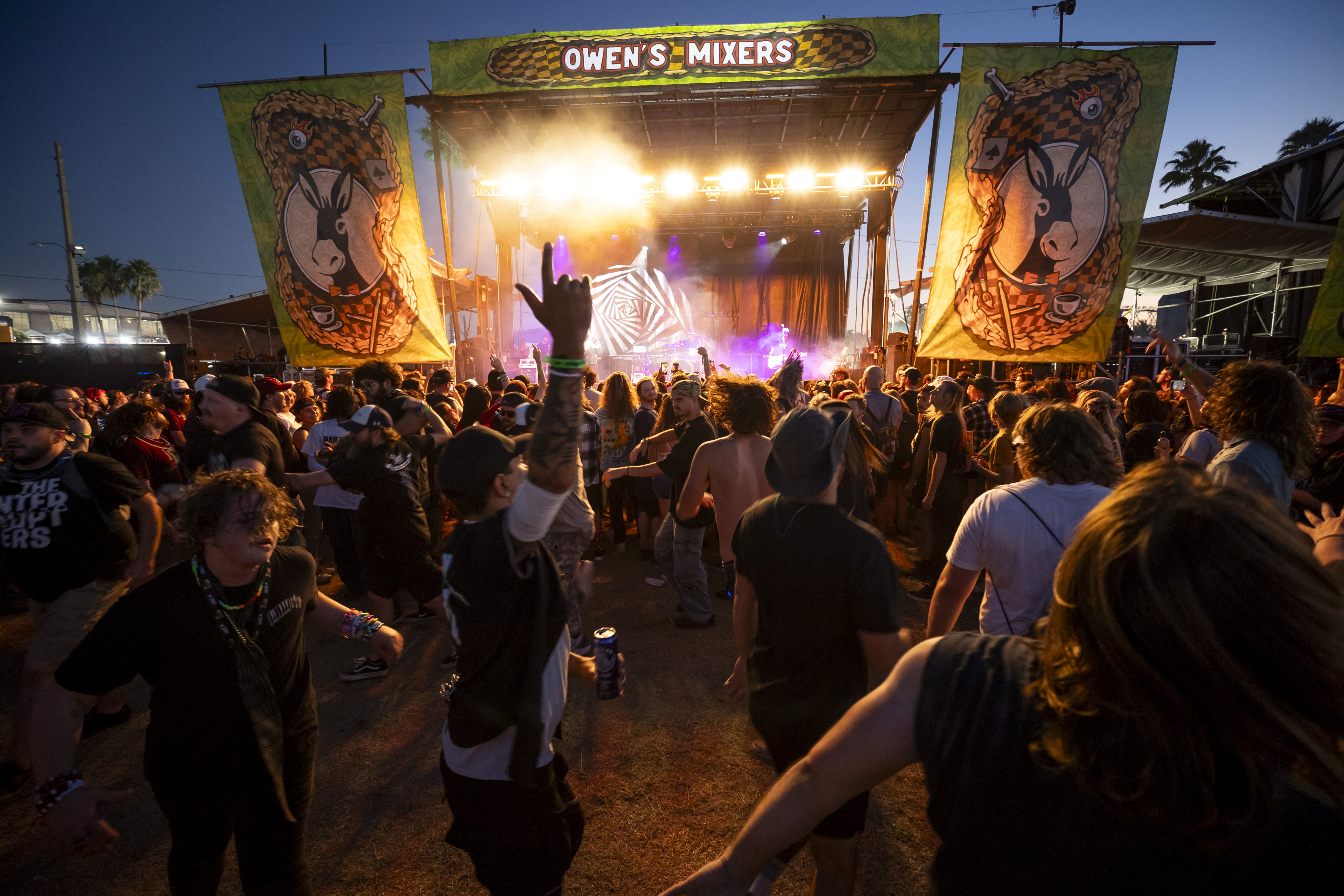 Fans form a mosh pit while Dinosaur Pile-Up performs at...