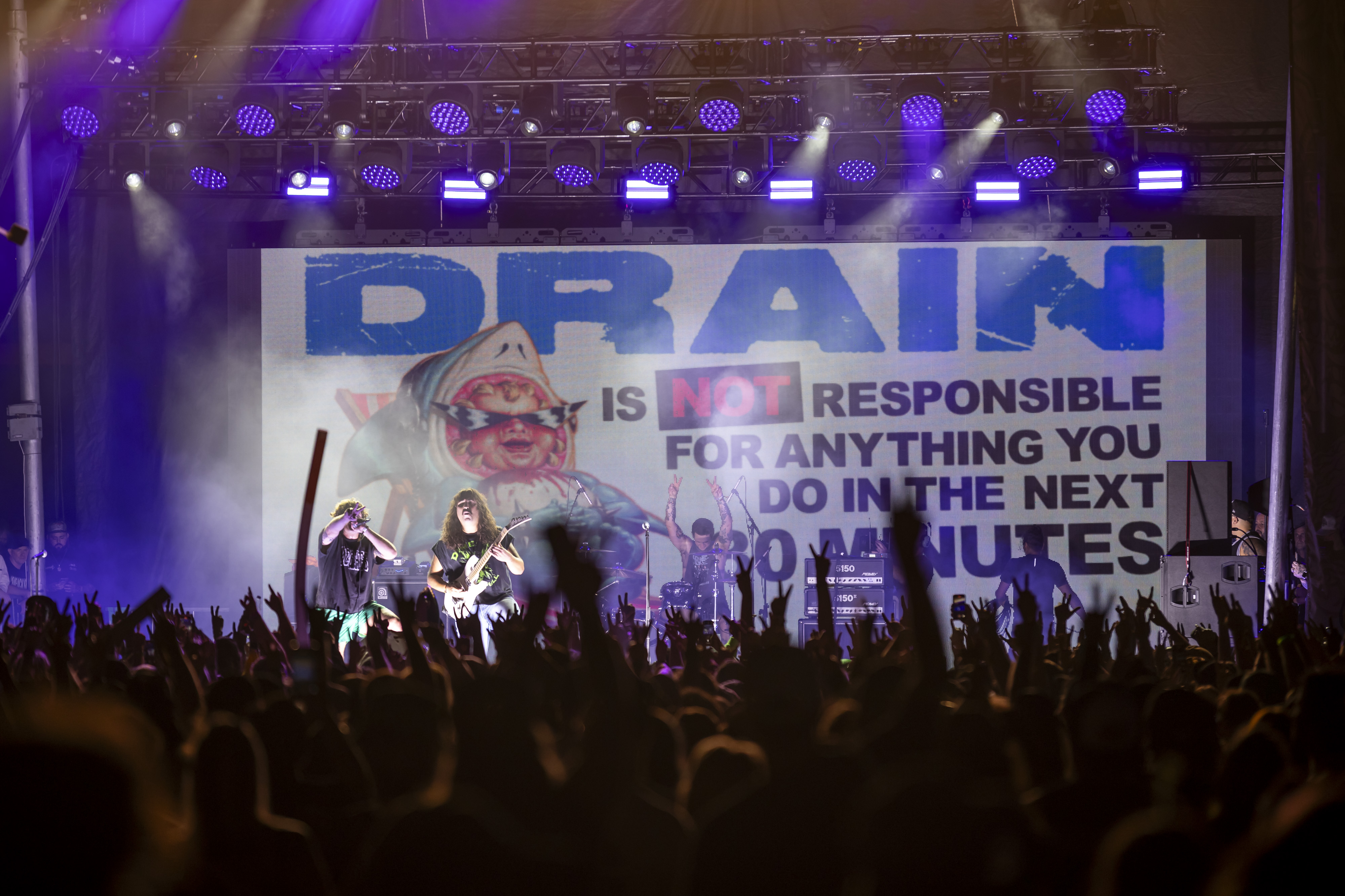 Drain performs during Vans Warped Tour at Tinker Field outside...