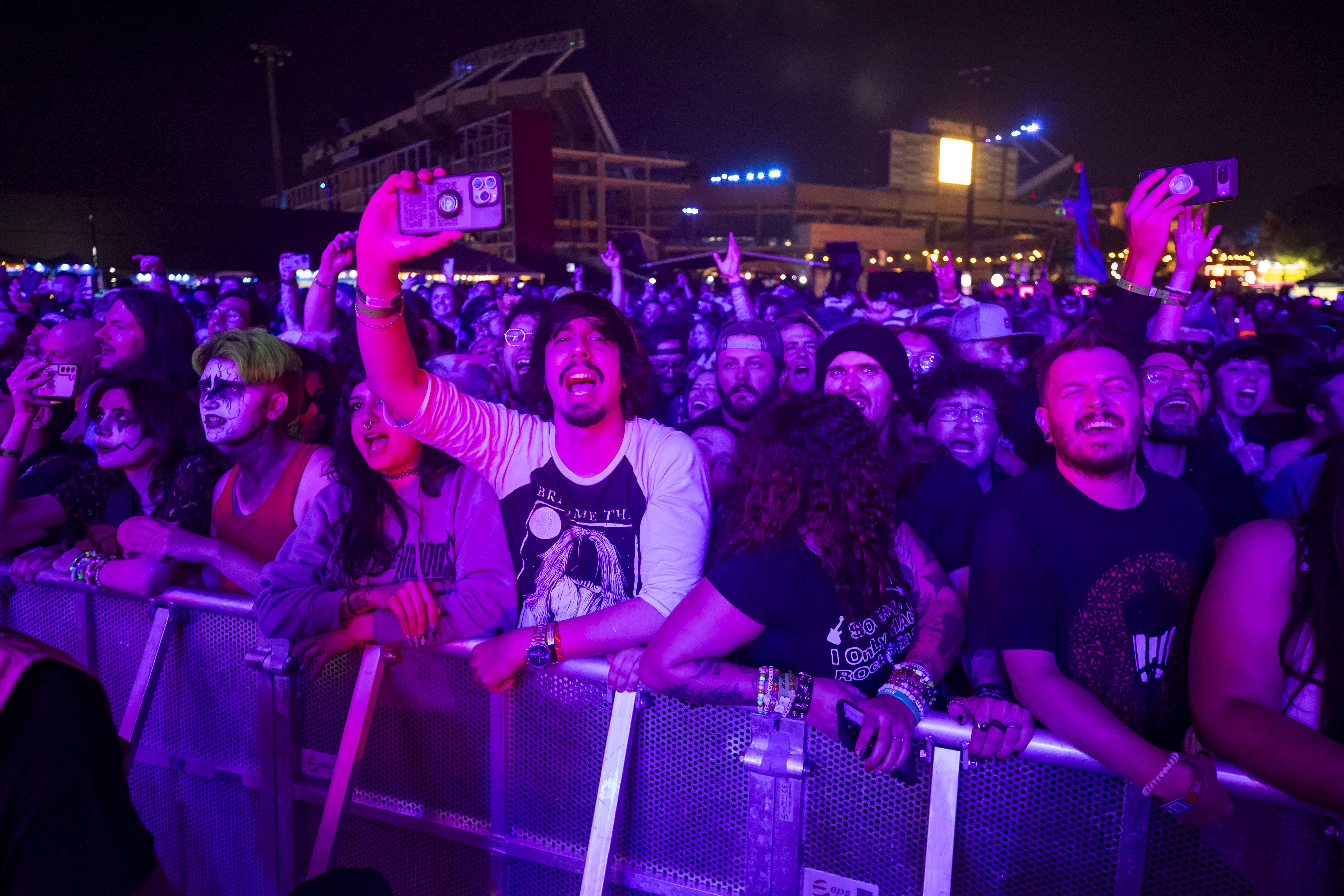 Fans sing along as Streetlight Manifesto performs during Vans Warped...