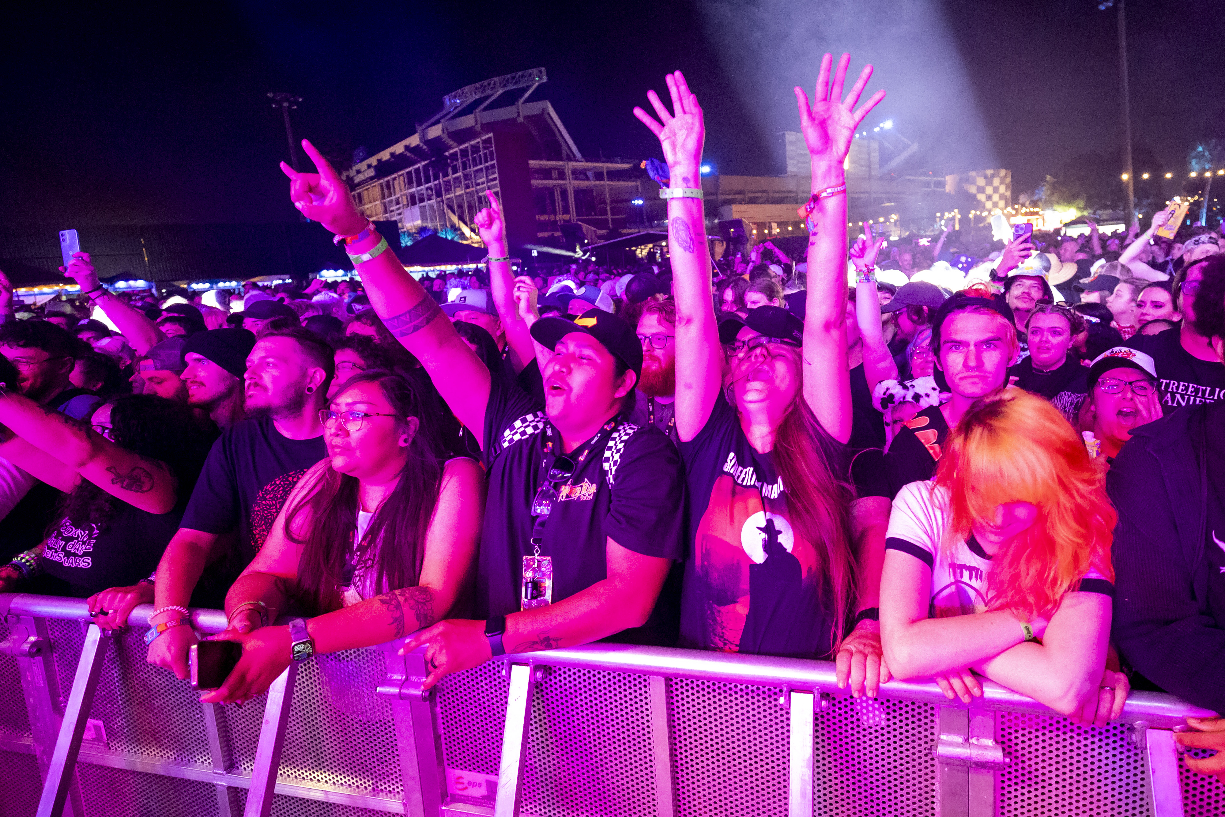 Fans sing along as Streetlight Manifesto performs during Vans Warped...