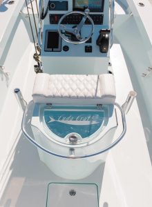 This live well and helm seat combo makes access to baits easier and running the boat more comfortable. Photo by George LaBonte