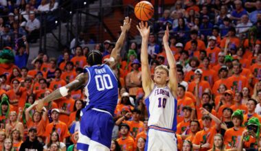 Florida's Thomas Haugh shoots the ball over Kentucky's Otega Oweh.
