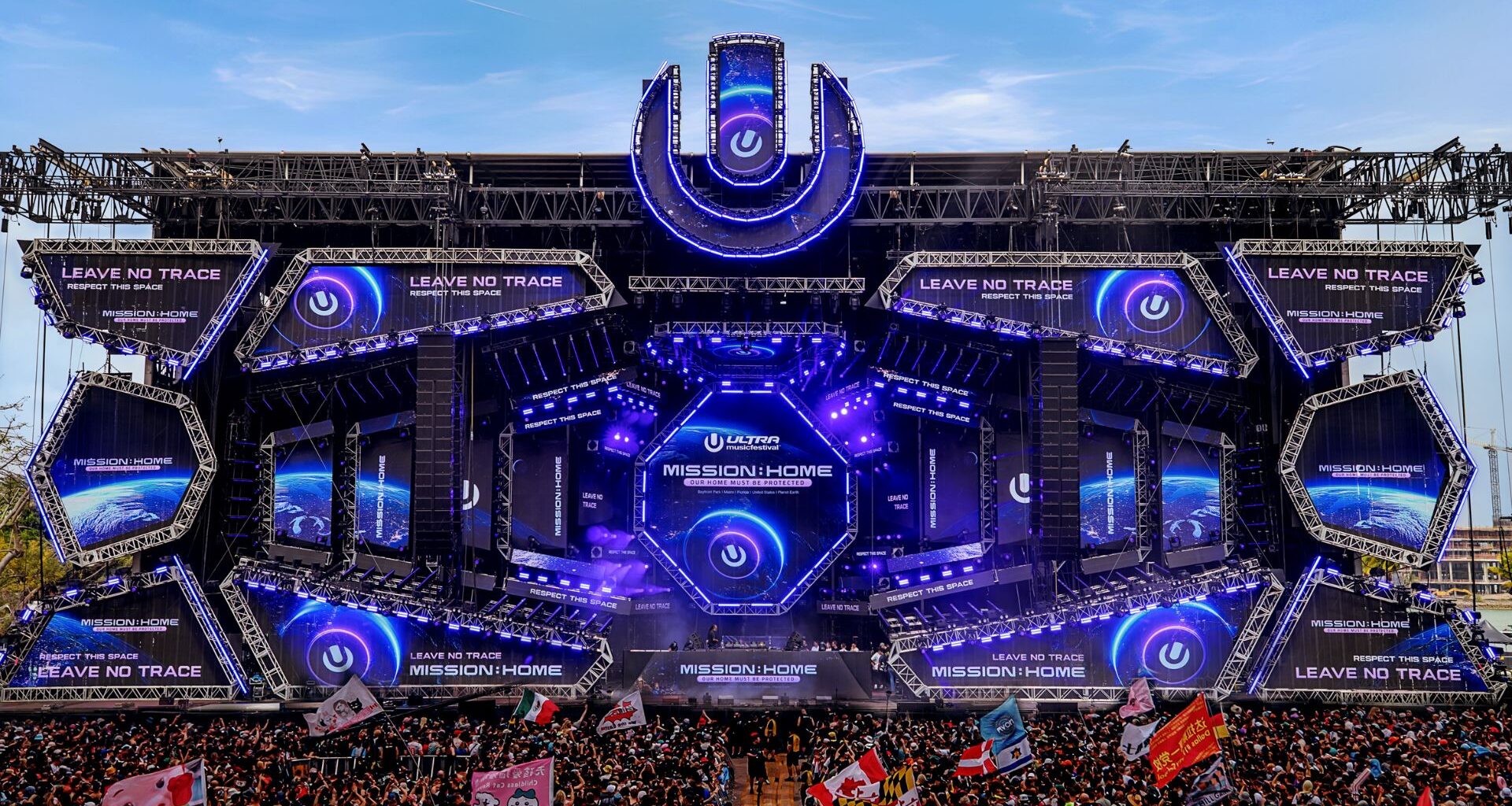 Photo so a stage at Ultra that reads mission home