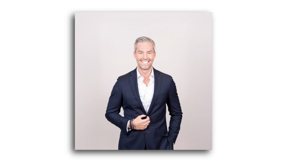 Ryan Serhant, founder and CEO of SERHANT., in a studio portrait.