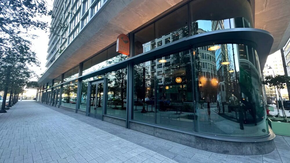 Small Giant and Wine on Water storefront at Water Street Tampa in downtown Tampa.