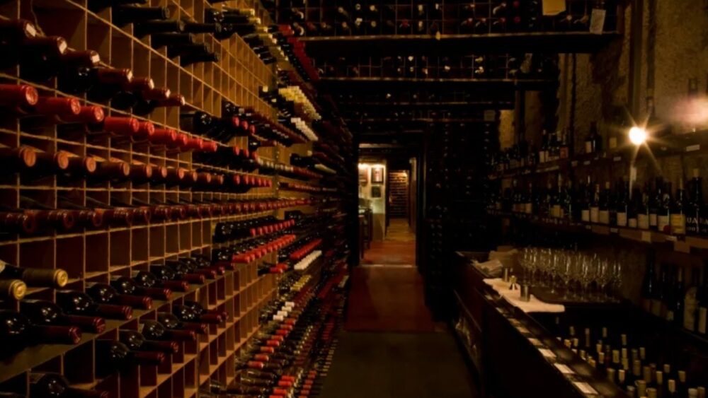 Rows of wine bottles stored floor to ceiling inside Bern’s Steak House wine cellar in Tampa.