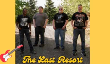 Four men stand outside with hands in their pockets. There's yellow script that read "The Last Resort" with a red guitar drawing in the bottom left corner.