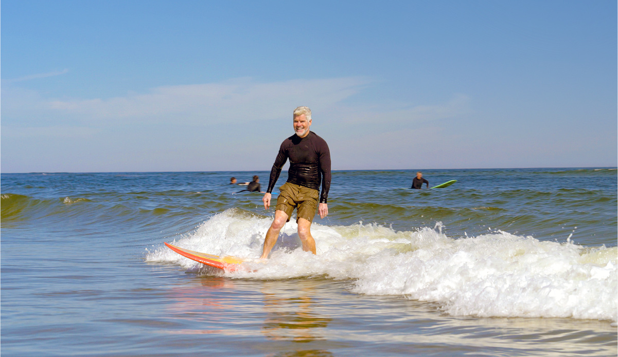 Kurtis Loftus on his longboard at Jacksonville Beach.