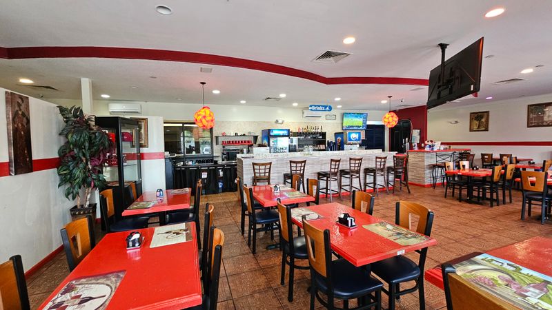 This Unassuming Haitian Spot In Port St. Lucie Is Serving Griot And Oxtails Worth The Drive 10 Service, Hours, and Vibe