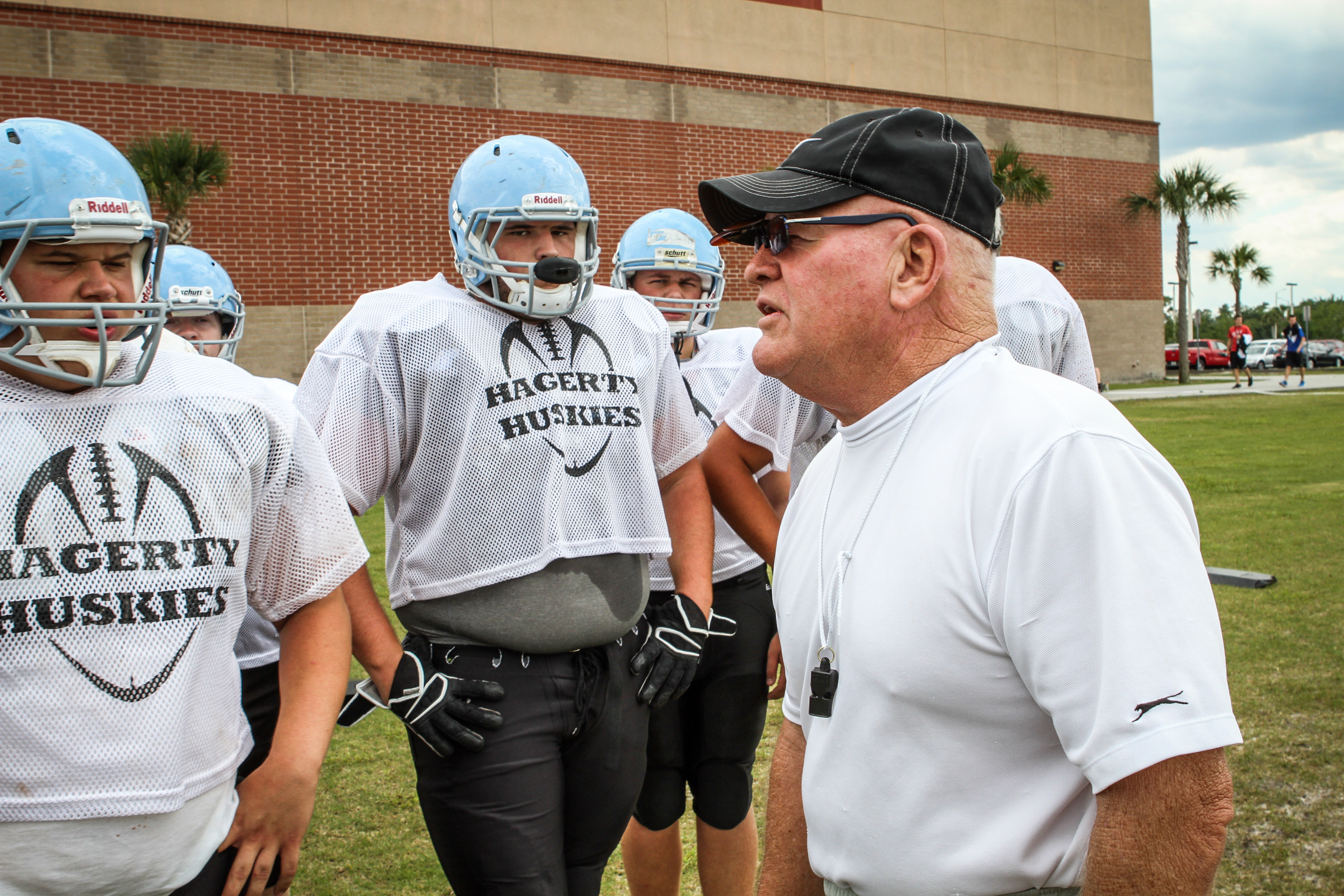 Phil Ziglar works with players during spring practice at Hagerty...