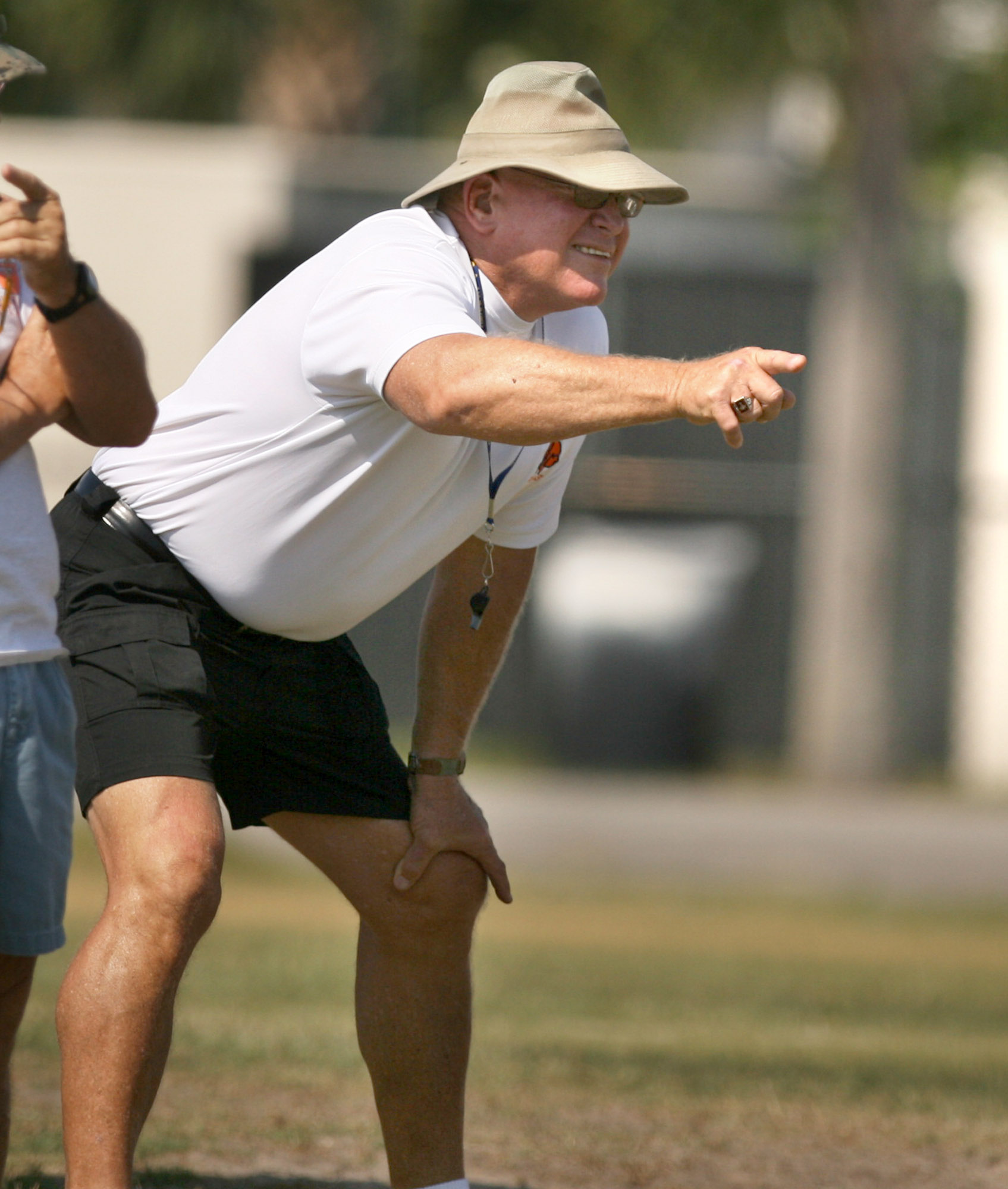 Coach Phil Ziglar coaches during football practice at Boone High...
